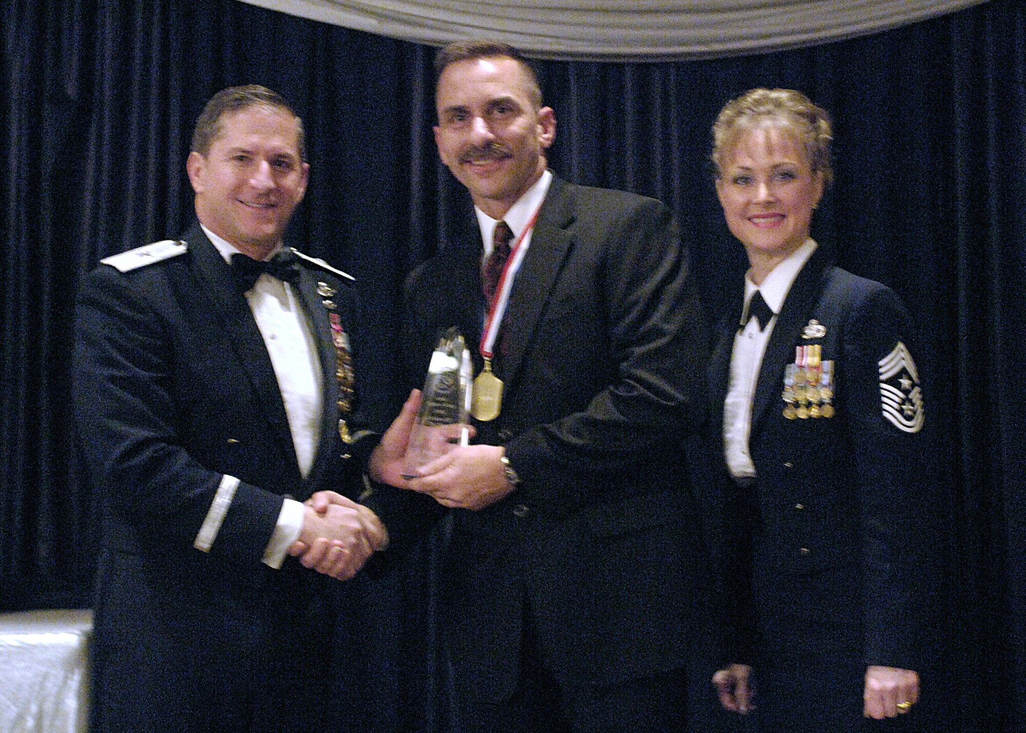 Civilian of the Year Category II, Mr. Phillip Korbakes, 49th Security Forces Squadron.