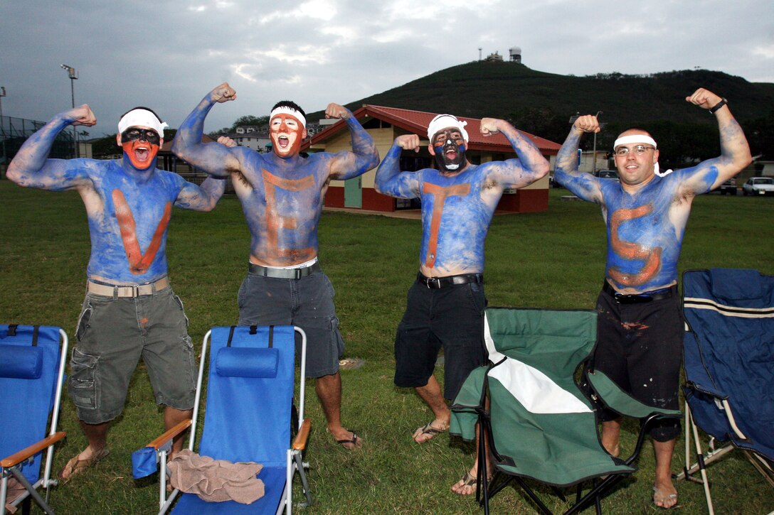 The players from the 3rd Battalion 3rd Marine Regiment Vets drew a large crowd of fans from throughout their command. During a game against the Marine Aircraft Group 24 The Wing, held at Marine Corps Base Hawaii, Kaneohe Bay, Hawaii, March 5, the fans painted themselves blue, cheered and sung on the sidelines.