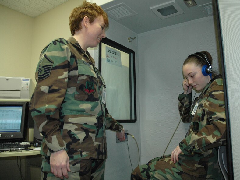 Master Sgt. Michelle Rootes and Airman 1st Class Christina Moran, both from the 5th Medical Operations Squadron, perform a routine inspection of a hearing booth at the 5th Medical Group. Sergeant Rootes recently won two Air Force level awards. Sergeant Rootes was awarded the 2006 Col. Cleveland L. Parker Award - Public Health Senior NCO of the Year and was a member of the Air Force Expeditionary Medics, who were named as the 2007 Air Force Team of the Year. (U.S. Air Force photo by Senior Airman Danny Monahan)