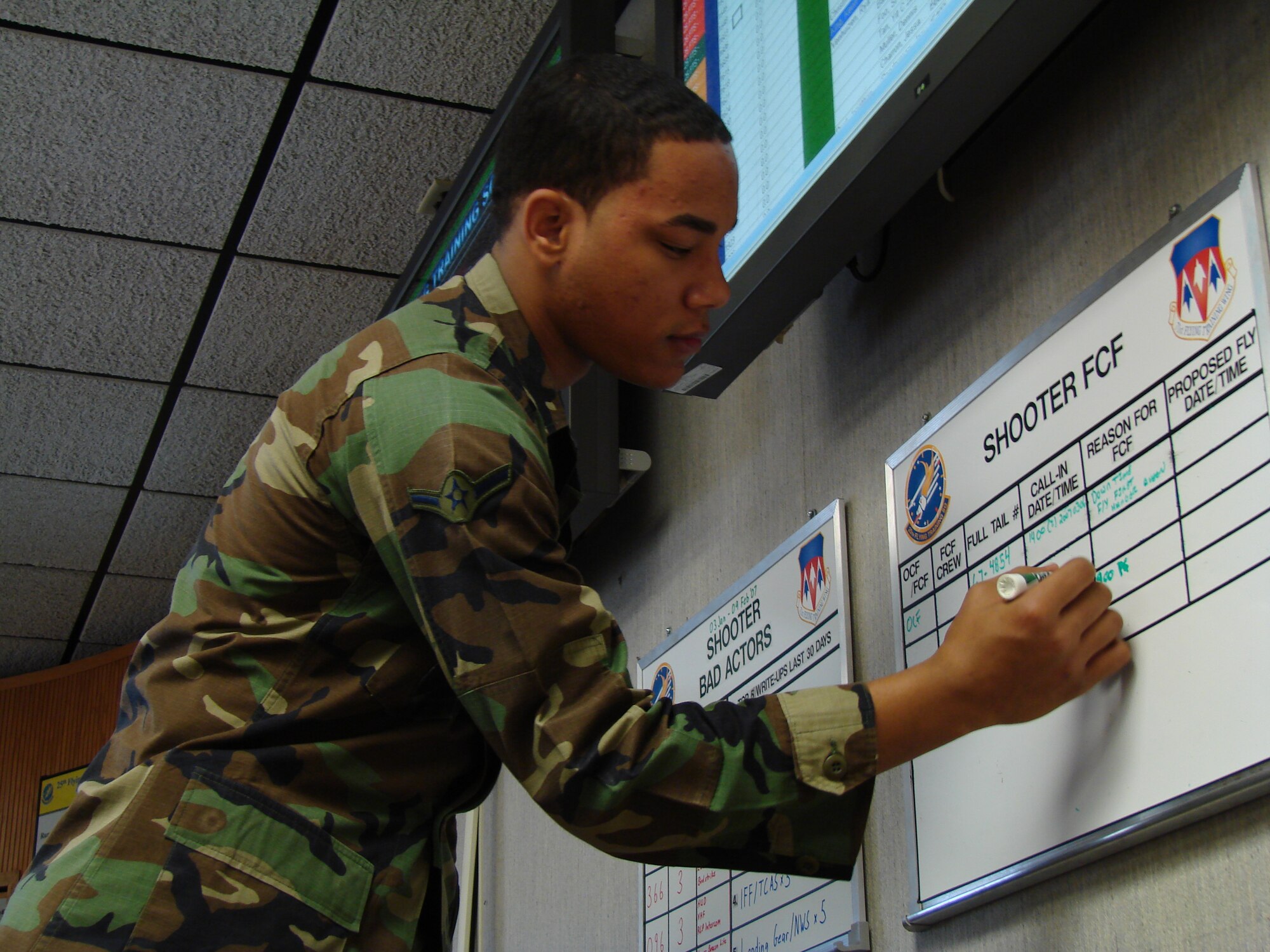 (Photo by 2d Lt. James Justice) Airman Dennis Munch tracks information for T-38 functional check flights.