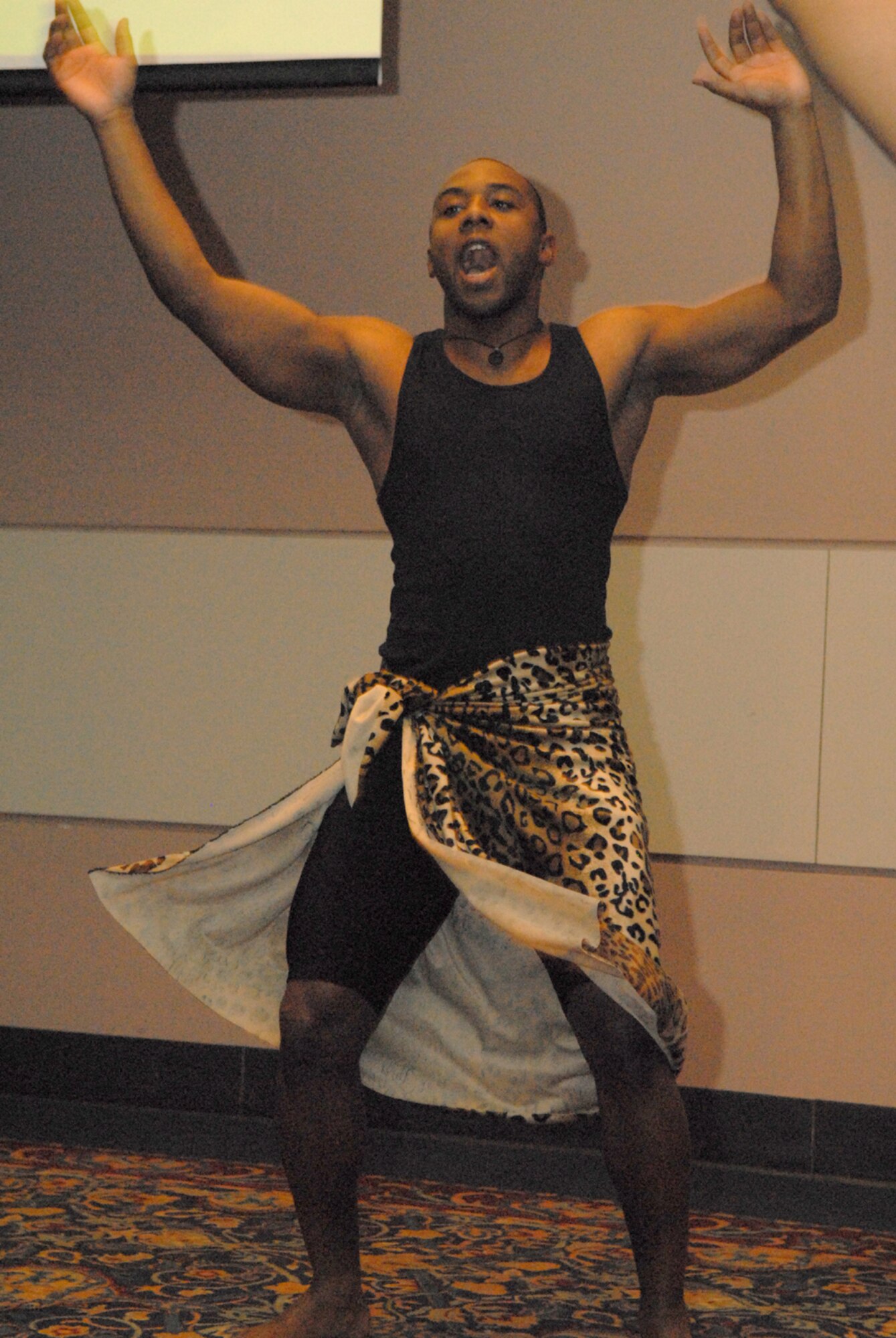 Staff Sgt. Charmane Tatum performs an African tribal dance during the evening. (U.S. Air Force photo by Tech Sgt. Randy Mallard)