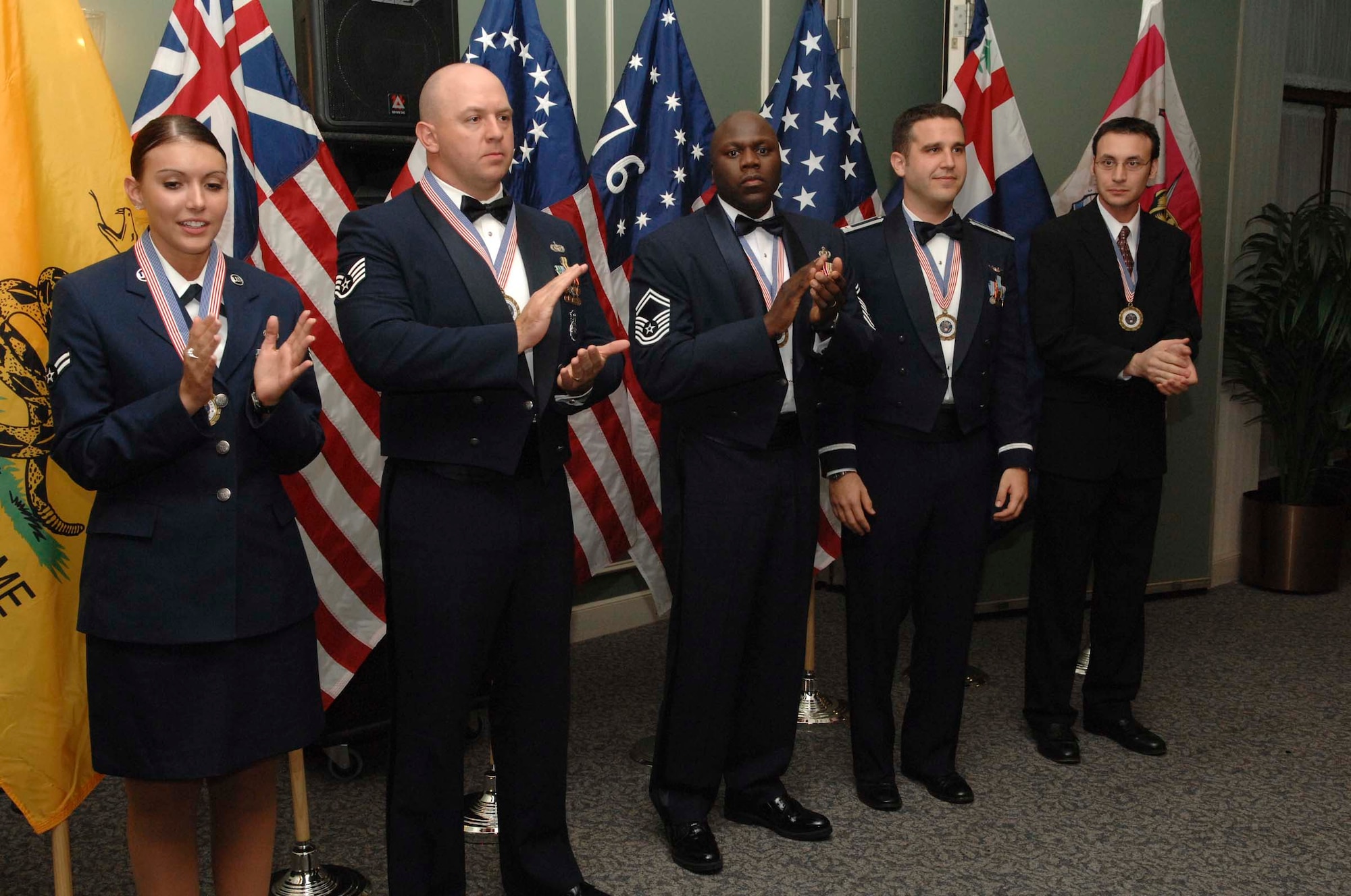 SHAW AIR FORCE BASE, S.C. -- The 9th Air Force Outstanding Performers of the Year were announced during a banquet March 2 at Shaw Air Force Base, S.C. The winners were Airman 1st Class Crystal Moore, 20th Security Forces Squadron, Shaw; Staff Sgt. Geoffrey Welsh, 4th SFS, Seymour Johnson AFB, N.C.; Senior Master Sgt. Randy Thompson, 1st Logistics Readiness Squadron, Langley AFB, Va.; Capt. Kevin Hornburg, 1st Fighter Wing, Langley; WG-11 Bradley Pabst, 4th Component Maintenance Squadron, Seymour Johnson; GS-13 Loretta Vega, 1st Services Squadron, Langley (not pictured) and first sergeant Senior Master Sgt. Scott Delveau, 728th Air Control Squadron, Eglin AFB, Fla. (not pictured). (U.S. Air Force photo/Staff Sgt. Josef Cole)

