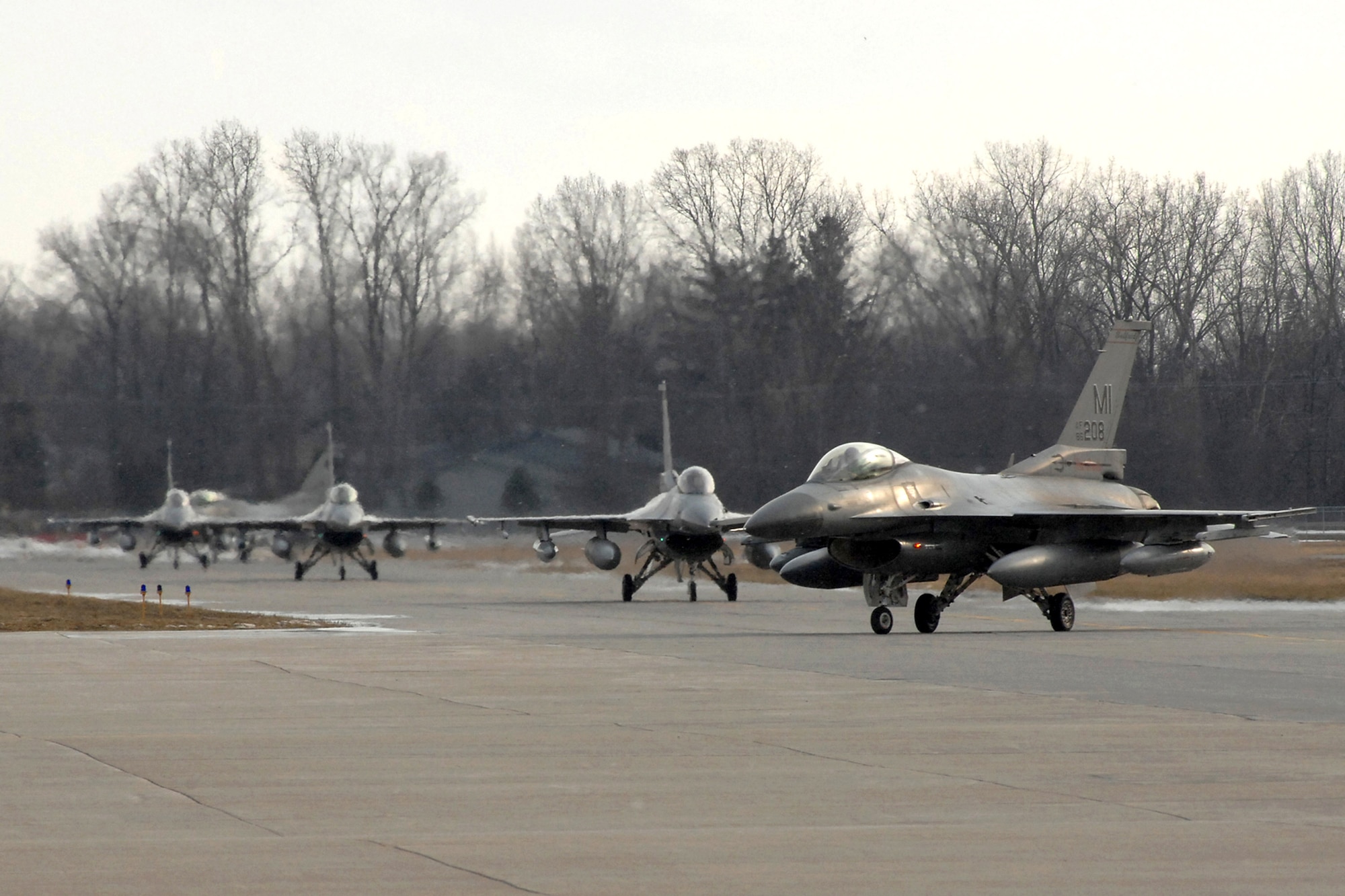 Twelve F-16 Fighting Falcons from the 127th Wing returned March 2 to Selfridge Air National Guard Base in Michigan after serving in support of Operation Iraqi Freedom. Approximately 250 members of the Michigan Air National Guard's 127th Wing were deployed to Balad Air Base, Iraq. (U.S. Air Force photo/John S. Swanson)
