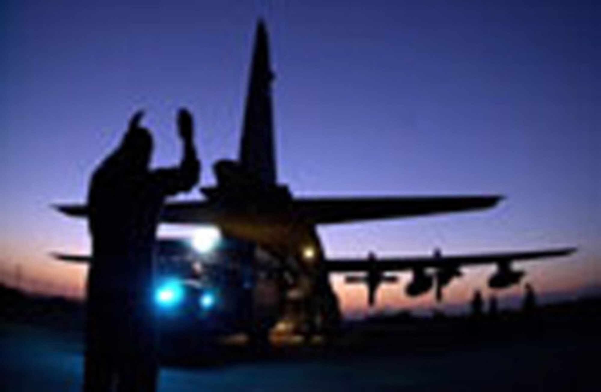 During Operation Northern Watch, Staff Sgt. Doug Perkins directs an ambulance into position to unload lifesaving equipment into the aircraft. The deployed medical team is from the 59th Medical Wing, Wilford Hall Medical Center at Lackland Air Force, Texas, and assigned to the 39th Medical Group at Incirlik Air Base Turkey. Sergeant  Perkins is assigned to Moody AFB, Ga. (U.S. Air Force photo by Master Sgt. Keith Reed)