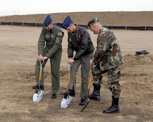 Officials broke ground Feb. 9 for the new 76th Space Control Squadron building at Pete East. Pictured are (left to right) Col. Wayne McGee, 21st Operations Group commander, Col. Jay Santee, 21st Space Wing commander, and Lt. Col. Jim Jennings, 76th SPCS commander. (U.S. Air Force photo by Allen Clutter)