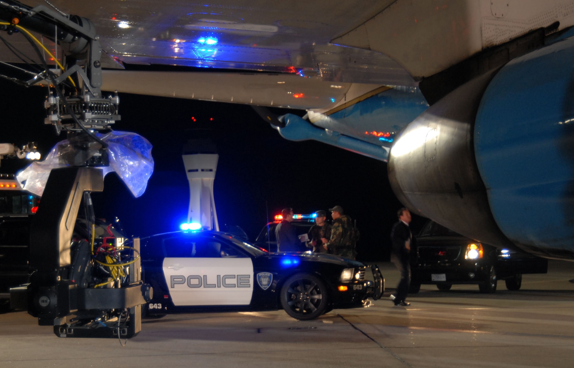 A crane-mounted camera shoots a scene for the upcoming "Transformers" movie at the Speckled Trout here Feb. 28, 2007. Several Edwards Airmen were featured in the background. (Photo by 1st Lt. Brad Kimberly)