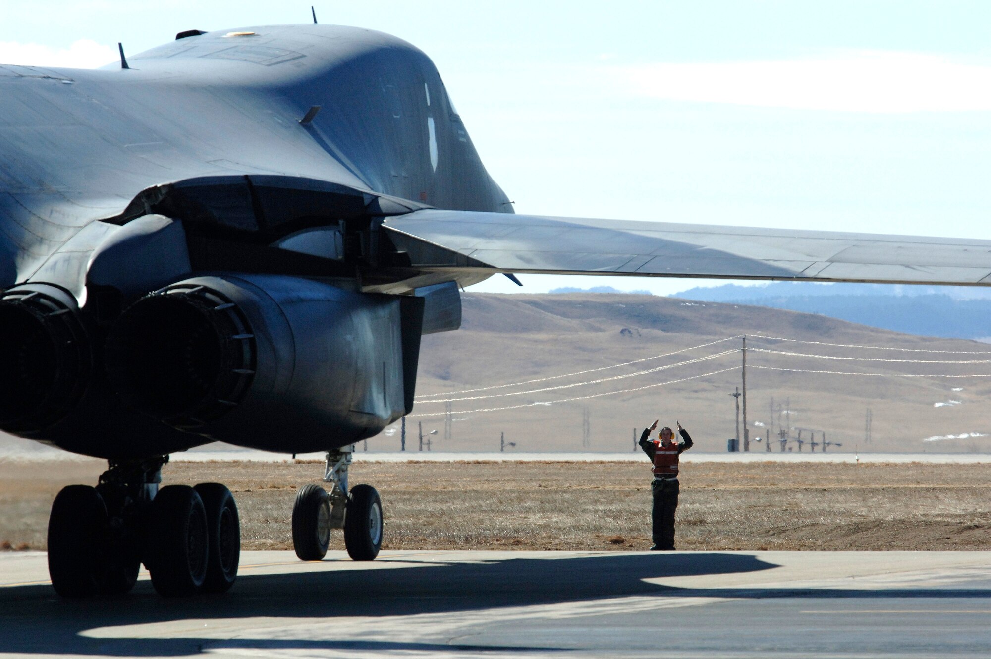 A B-1B Lancer from the 34th Bomb Squadron is cleared to taxi out to the Ellsworth Air Force Base, S.D., runway March 06 for an operational readiness exercise mission.  Base officials are preparing for a scheduled operational readiness inspection later this year.  (U.S. Air Force photo/Staff Sgt. Michael B. Keller)