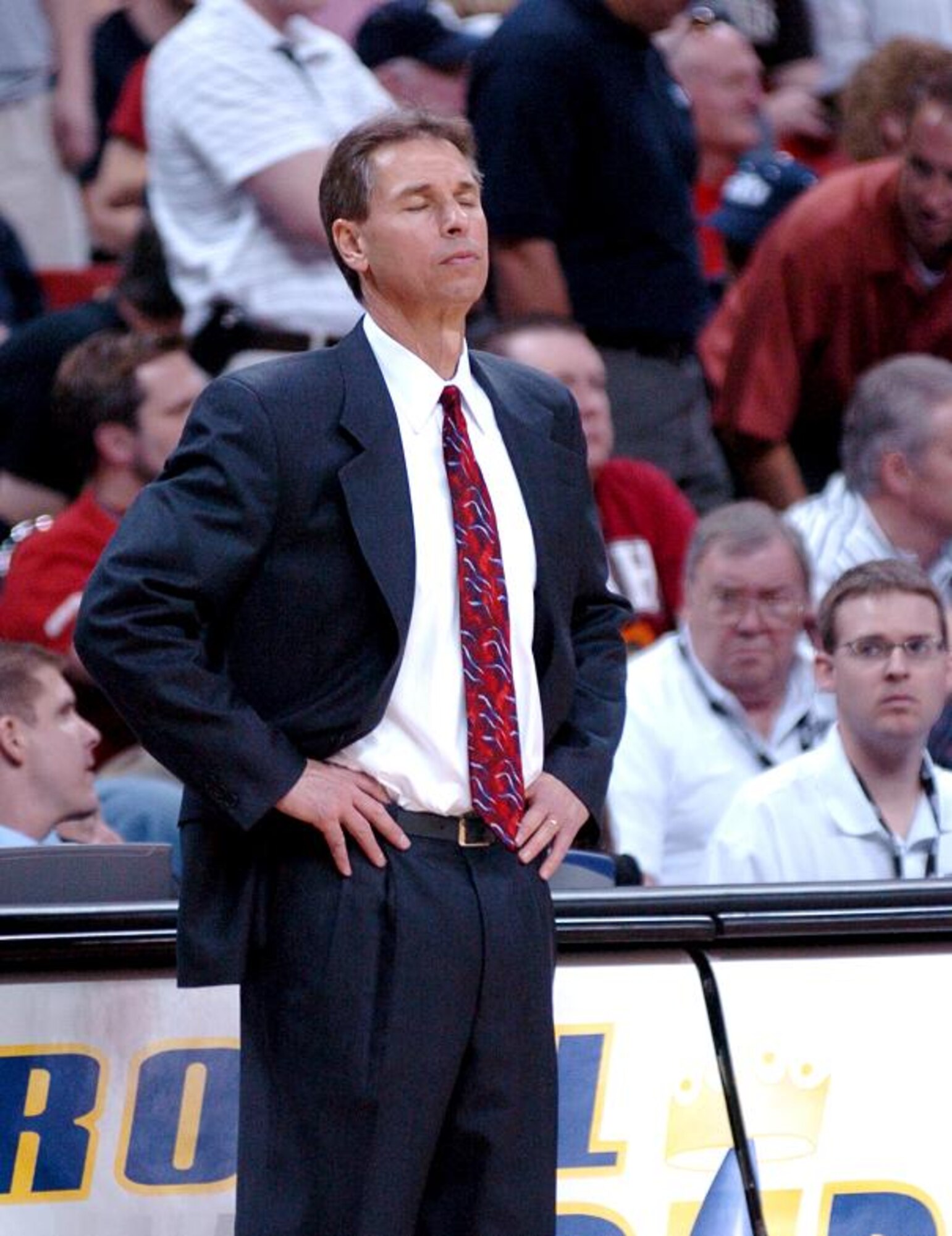 Air Force basketball head coach Jeff Bzdelik takes a moment of personal reflection as his Falcons trail Wyoming by seven points in aquarterfinal game at the Mountain West Conference tournament in Las Vegas Thursday, March 8. Nationally ranked nearly the entire season, the Falcons were eliminated in their first game of the tourney, 67-62. Air Force now has an all-time record of 0-8 in the MWC tournament. (U.S. Air Force photo/1Lt John Ross)