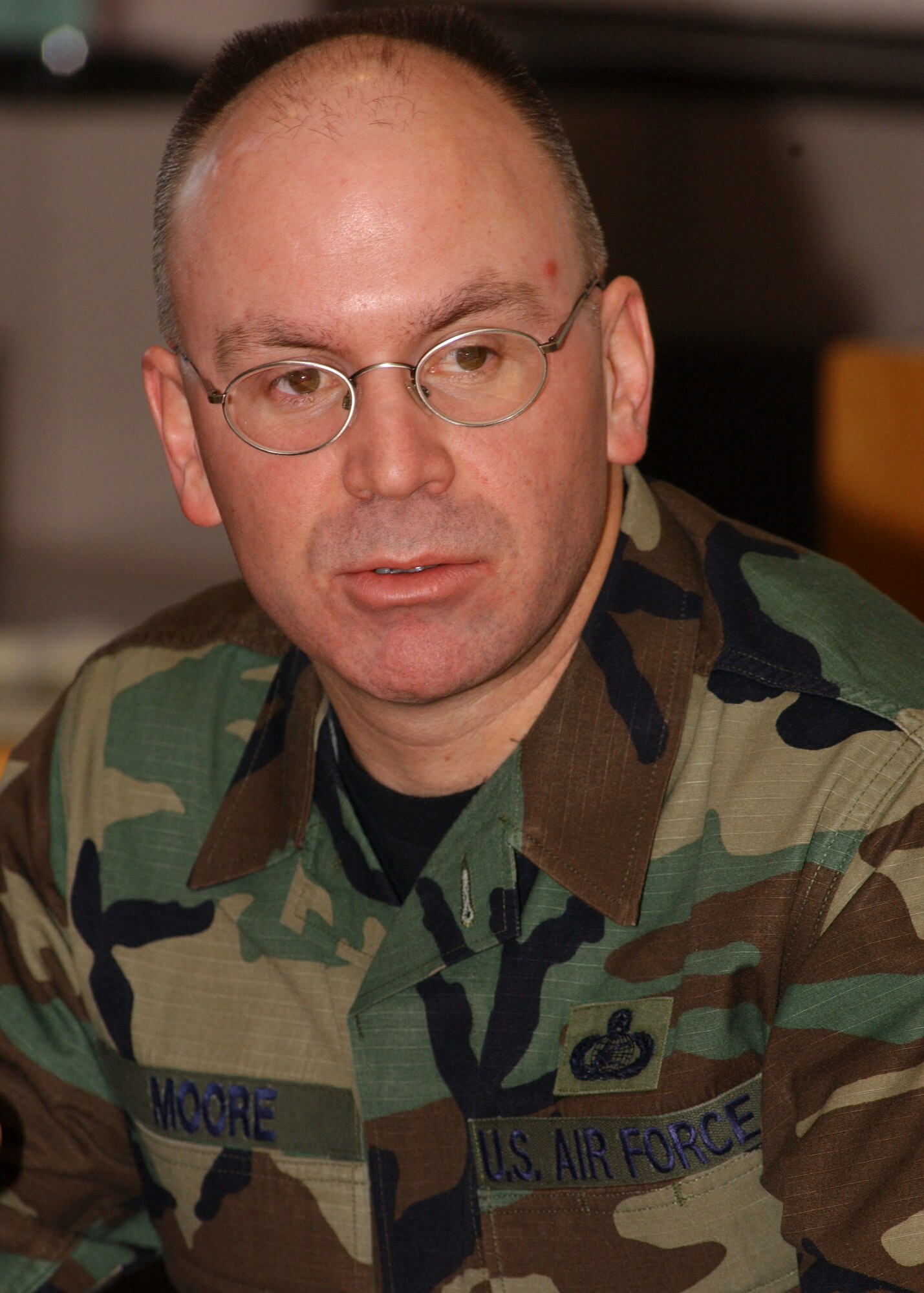 EIELSON AIR FORCE BASE, Alaska -- Command Chief Master Sgt. Robert Moore, 11th Air Force Command Chief, talks with members of Airman Committed to Excellence (A.C.E.) during breakfast at the Two Seasons Dining Facility on March 8. Chief Moore discusses with A.C.E. members about their impact and importance on base for quality of life projects and activities for Airman. (U.S. Air Force photo by Airman 1st Class Jonathan Snyder)