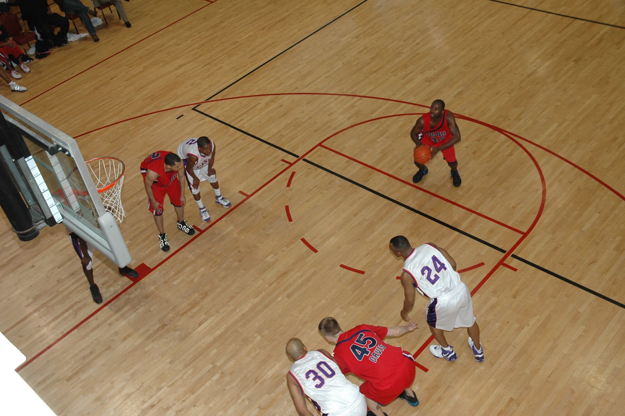 OSAN AIR BASE, Republic of Korea --  James Williams, No. 33 on the Team Osan basketball team, shoots his second free throw during his team’s game against Camp Casey on Sunday. Team Osan had a perfect season, winning all 45 games they played. They are currently in Kadena, Okinawa, to play in a Pacific Air Forces tournament against all other bases in the command. (U.S. Air Force photo by Senior Airman Brok McCarthy)
