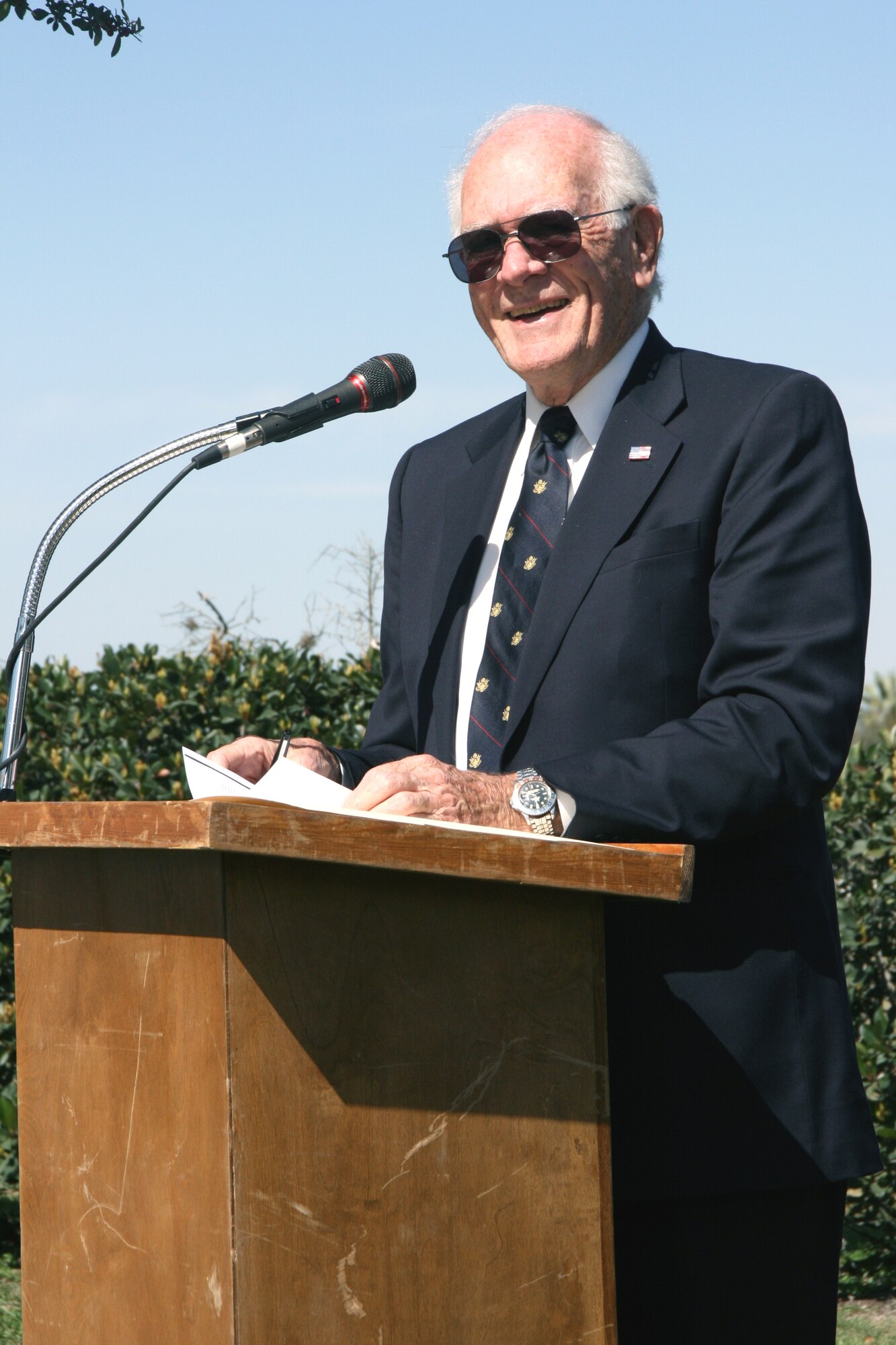 Oliver R. Crawford recounts the events leading up to the first military aerial flight that took place 97 years ago at the Fort Sam Houston, Texas, parade ground during a commemoration ceremony there March 2.  Mr. Crawford is a member of the Order of Daedalians and former World War II pilot.    (U.S. Army photo/Minnie Jones)