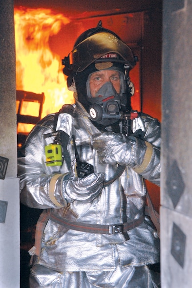 MOODY AIR FORCE BASE, Ga. -- David LaPlante, 23rd Civil Engineer Squadron, leaves the Moody fire training room after inspecting a training fire March 3. The fire flight would like to remind Team Moody smoke and carbon monoxide detectors need to be tested monthly and replaced according to manufacturer standards. (U.S. Air Force photo by Airman 1st Class Gina Chiaverotti)
