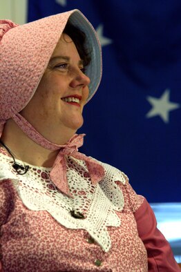 Paula Taylor, Warren ICBM/Heritage Museum director, poses in a traditional pioneer outfit. Mrs. Taylor has been director of the museum at F.E. Warren Air Force Base, Wyo., for 15 years. (U.S. Air Force photo/Senior Airman Javier Cruz Jr.) 