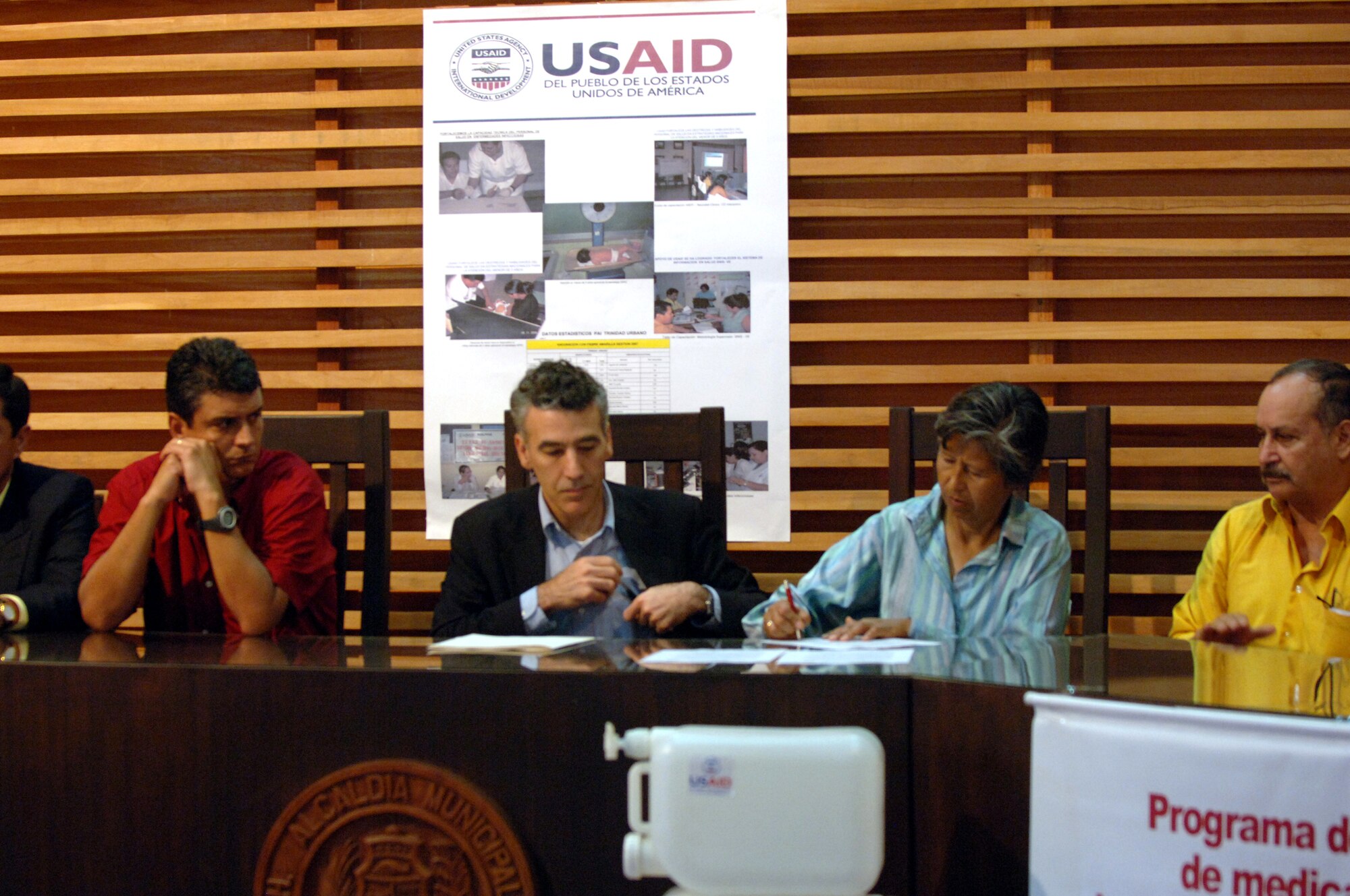 Philip S. Goldberg, the U.S. Ambassador to Bolivia, and Nilda Heredia, the Bolivian Minister of Health, sign an agreement March 5 in Trinidad, Bolivia to expand the vaccination and distribution of medical supplies in times of crisis. U.S. Southern Command, in cooperation with the U.S. Agency for International Development, is delivering humanitarian supplies in response to devastating floods in Eastern Bolivia. (U.S. Army photo/Spc. Clayton Corey)