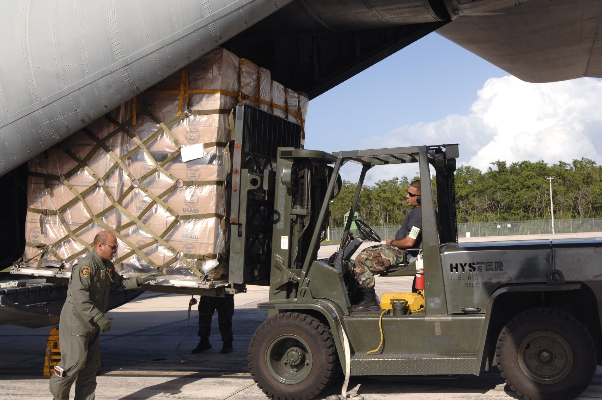 A C-130 Hercules is loaded with humanitarian supplies March 4 in San Juan, Puerto Rico. U.S. Southern Command, in cooperation with the U.S. Agency for International Development, is delivering the supplies in response to devastating floods in eastern Bolivia. (U.S. Army photo/Spc. Clayton Corey)
