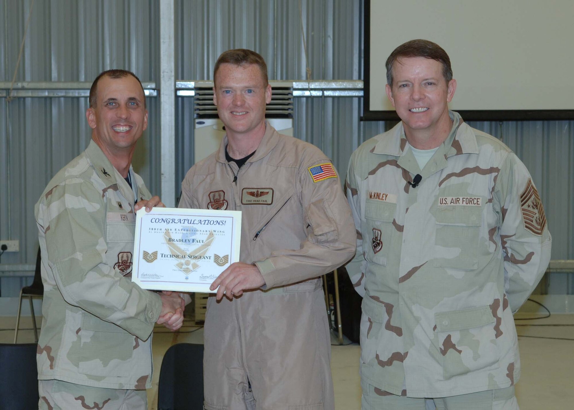 Staff Sgt. Brad Faul, 32nd Air Refueling Squadron Blue Eagle, was recently promoted to technical sergeant (while deployed to Southwest Asia) by the Chief Master Sgt. of the Air Force Rodney J. McKinley (right), and Col. Gregory Kern, 380th Air Expeditionary Wing commander.
