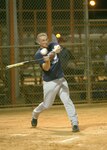 Lackland Warhawks third baseman Tony Formell swings hard against CFA Bomb Squad during the first game of the San Antonio Parks and Recreation Spring Softball League March 6 at the Alva Jo Fischer Memorial Softball Complex. Formell went 2-for-3, doubled and scored. (USAF photo by Robbin Cresswell)