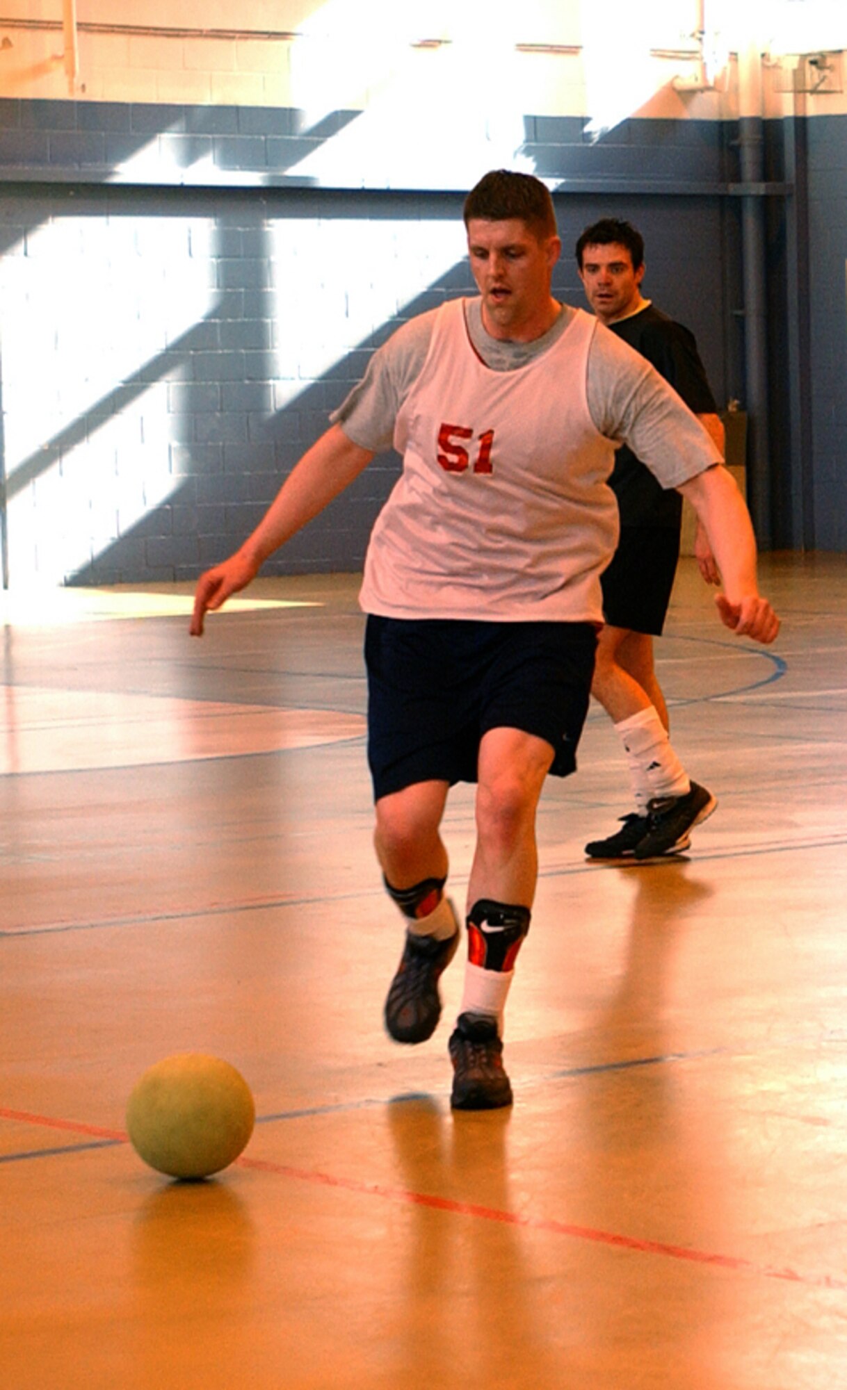 Jeremy Harris on the attack for 100 ARW with Bruce Richardson 100 SVS looking on. (U.S. Air Force photo by Airman Brad Smith)