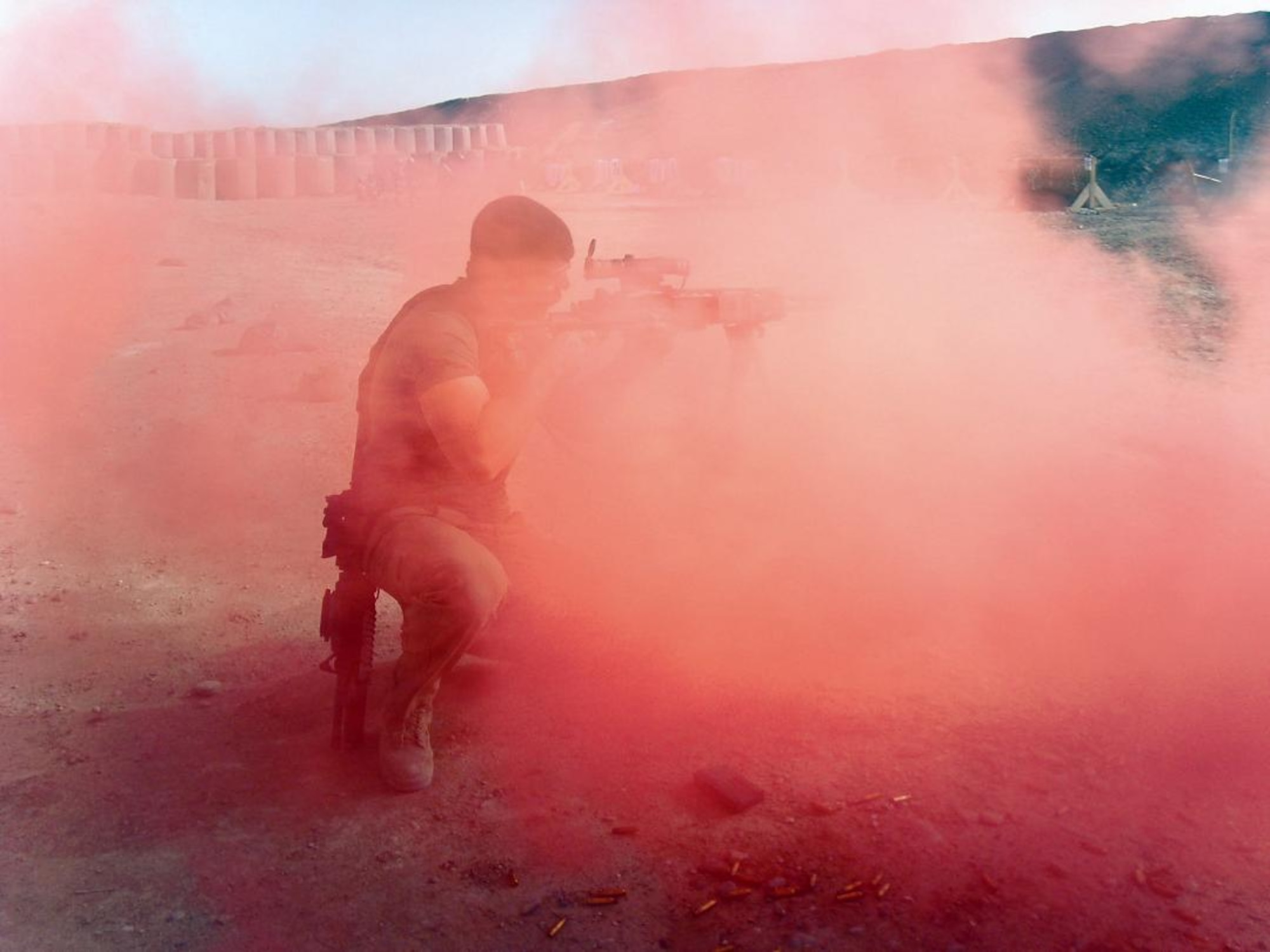 Senior Airman Christopher Keen, 306th Rescue Squadron pararescueman, practices his shooting skills out on the range during a training day at Kandahar Airfield, Afghanistan, Feb. 28. (U.S. Air Force photo/Senior Airman Andrea Wright)
