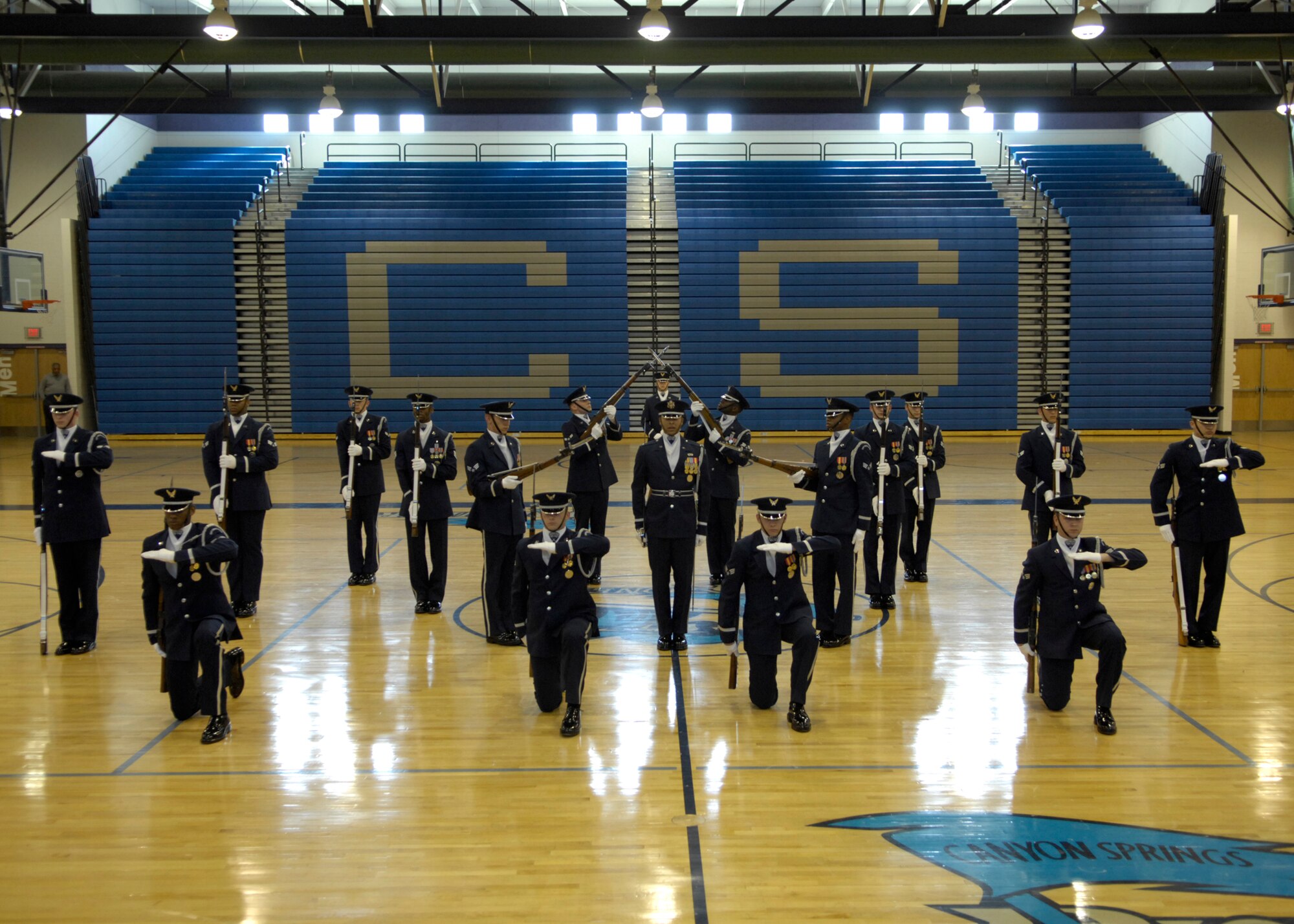 The United States Air Force Honor Guard Drill Team performs for students of Canyon Springs High School, Las Vegas, Nev., March 8, 2007. The Drill Team is the traveling component of the Air Force Honor Guard and tours Air Force bases world wide showcasing the precision of today's Air Force to recruit, retain, and inspire Airmen for the Air Force mission. (U.S. Air Force photo by Airman 1st Class Rusti Caraker)(Released)