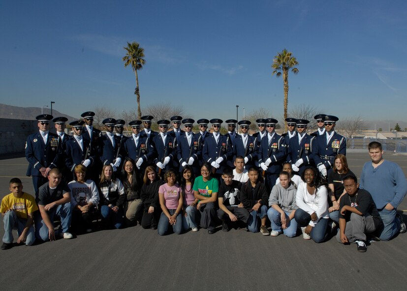 The United States Air Force Honor Guard Drill Team poses for a picture after their performance for students of Basic High School, Las Vegas, Nev., March 8, 2007. The Drill Team is the traveling component of the Air Force Honor Guard and tours Air Force bases world wide showcasing the precision of today's Air Force to recruit, retain, and inspire Airmen for the Air Force mission. (U.S. Air Force photo by Airman 1st Class Rusti Caraker)(Released)