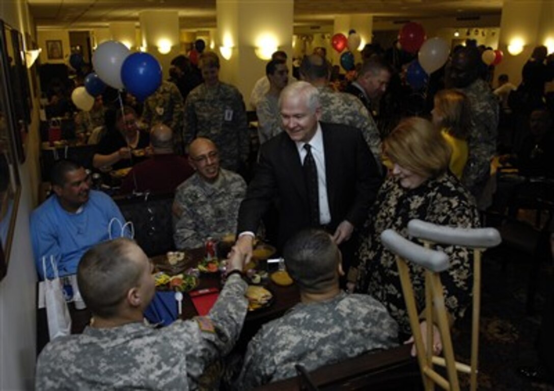 Secretary of Defense Robert M. Gates, and his wife Becky, meet with wounded servicemembers during a luncheon in their honor at the Pentagon, March 9, 2007.  