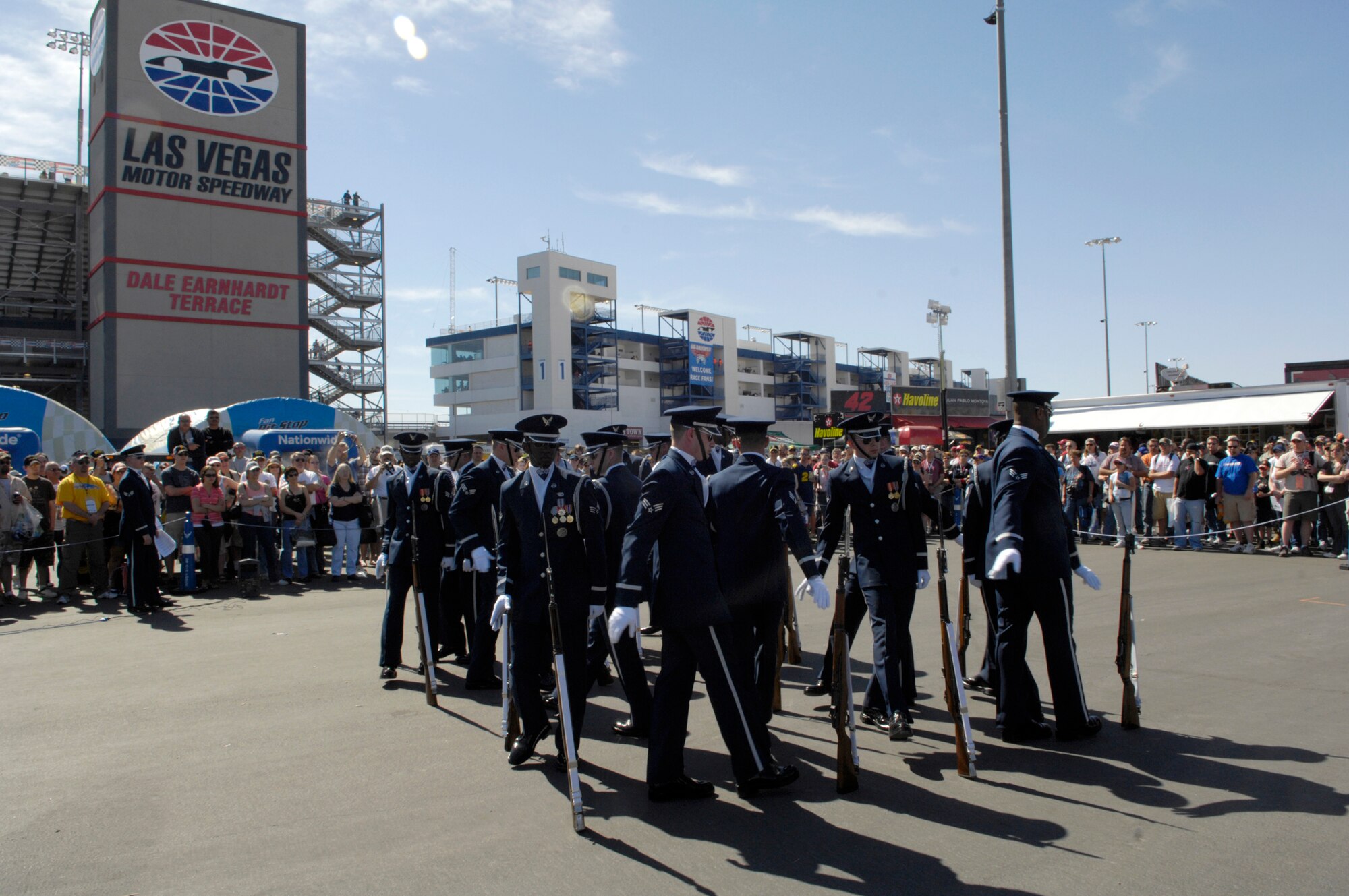 The United States Air Force Honor Guard Drill Team performs at the Las Vegas Motor Speedway, Las Vegas, Nev., March 10, 2007. The Drill Team is the traveling component of the Air Force Honor Guard and tours Air Force bases world wide showcasing the precision of today's Air Force to recruit, retain, and inspire Airmen for the Air Force mission. (U.S. Air Force photo by Airman 1st Class Rusti Caraker)(Released)