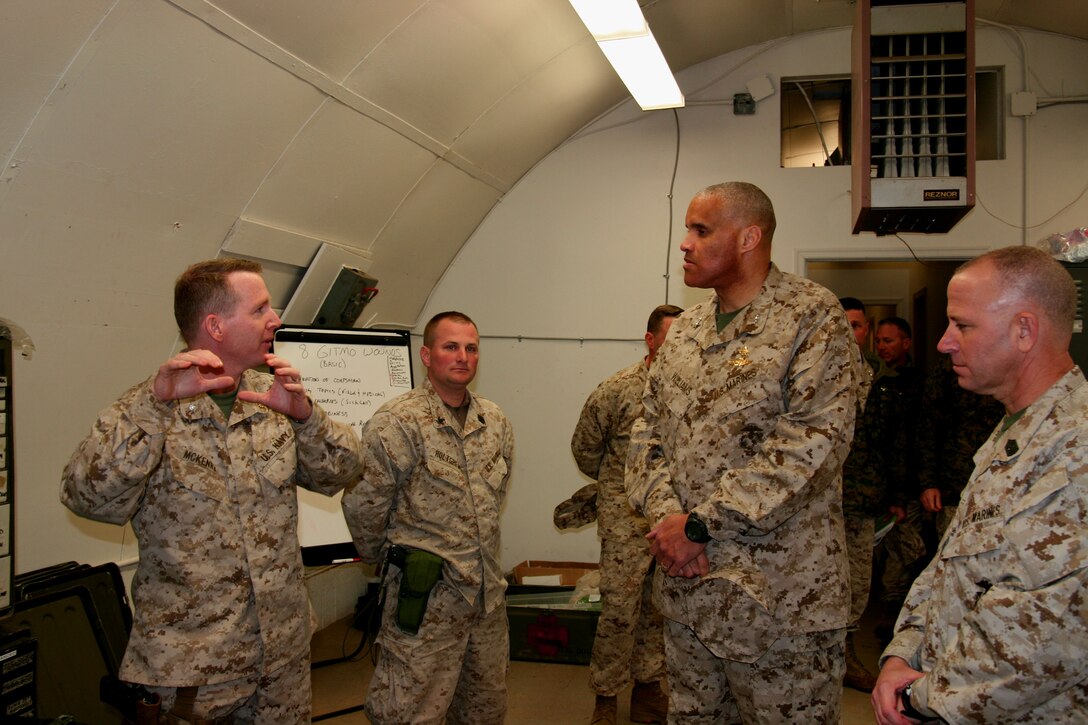 Cdr. Dennis McKenna (left), briefs Maj. Gen. James L. Williams, the 4th Marine Division Commanding General, at aid station on Camp Upshur during Williams' March 10, 2008 visit to reserve annual training here.  Reserve officers typically have a two to four week annual training (AT) with their units each year.  Some ATs take place in Australia, Morocco and various countries in Africa and South America.
