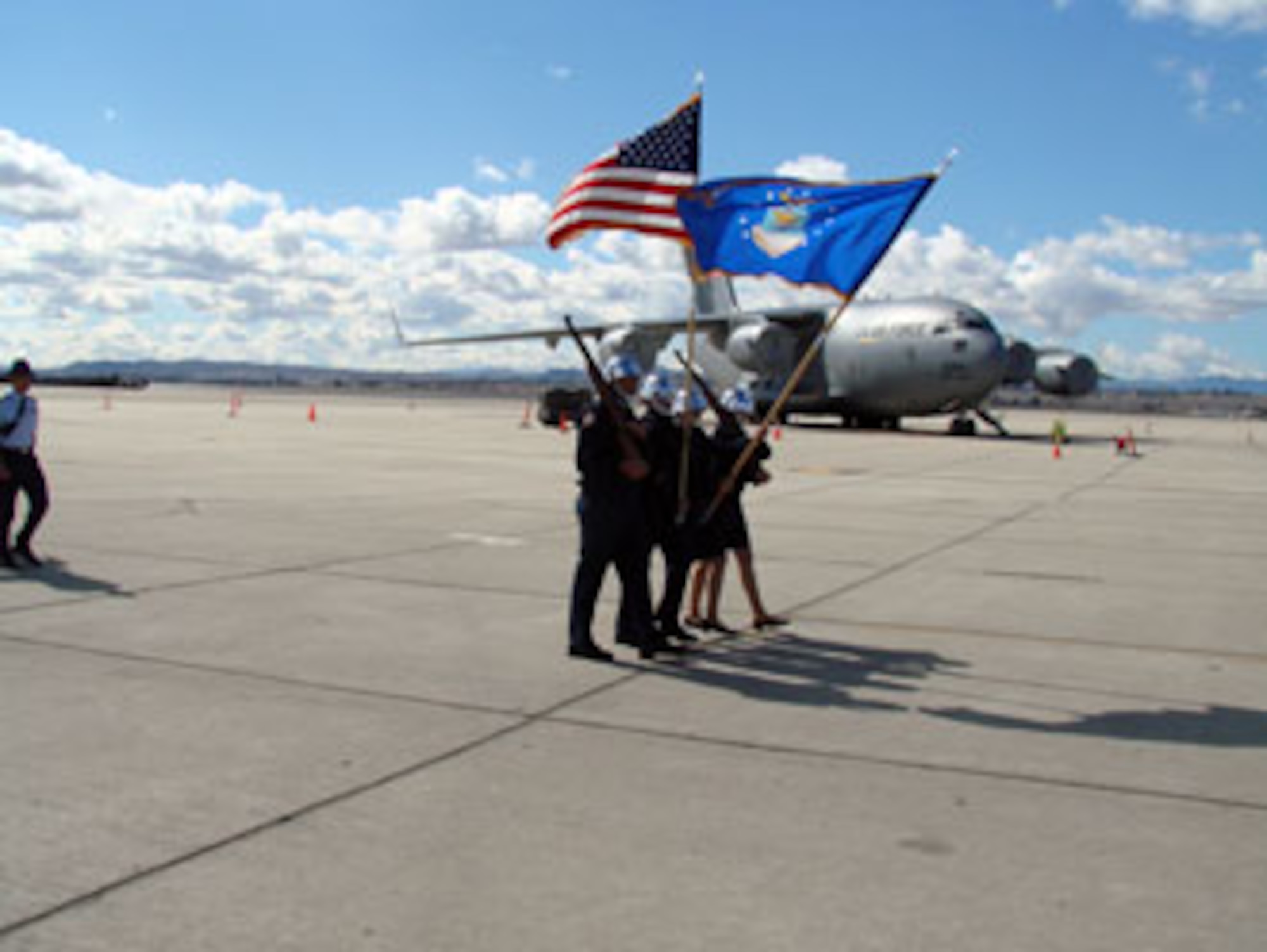 Some 400 Air Force Junior ROTC cadets recently performed a Pass in Review ceremony at March Air Reserve Base. The Pass in Review is a long-standing military tradition that began as a way for a newly assigned commander to inspect their troops. Brig. Gen. James L. Melin, commander, 452nd Air Mobility Wing, served as the reviewing officer. Cadets from several schools in the area participated in the ceremony. Afterwards, the students were treated to pizza and soda served by local community members. (U.S. Air Force photos by Maj. Don Traud)