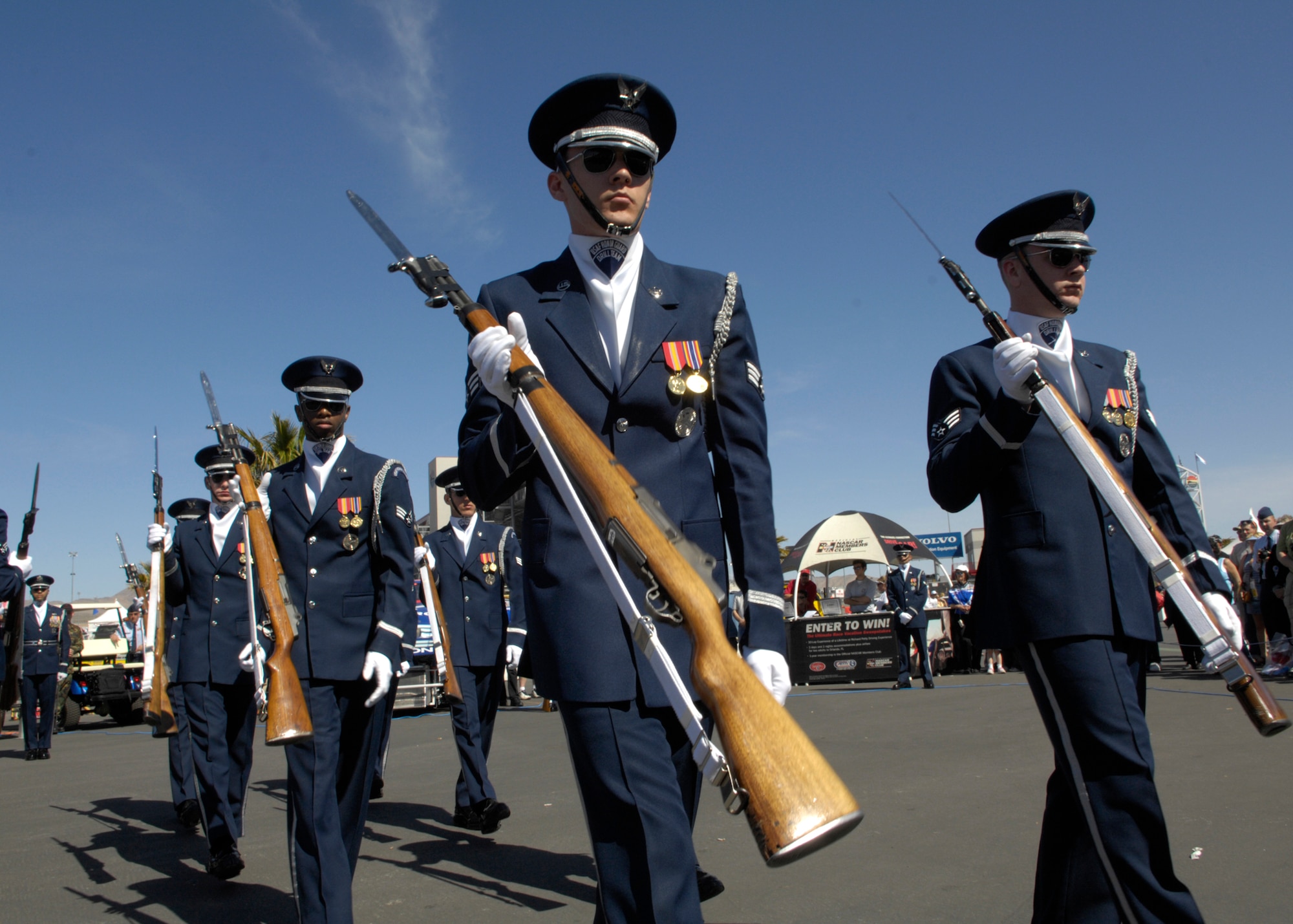 The United States Air Force Honor Guard Drill Team performs at the Las Vegas Motor Speedway, Las Vegas, Nev., March 10, 2007. The Drill Team is the traveling component of the Air Force Honor Guard and tours Air Force bases world wide showcasing the precision of today's Air Force to recruit, retain, and inspire Airmen for the Air Force mission. (U.S. Air Force photo/Airman 1st Class Rusti Caraker)