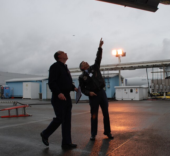 Crew members and maintenance are responsible for checking the C-40C plane before flight to look for anything odd or out of place.  This new plane took off without a hitch for the 932nd Airlift Wing test flight.