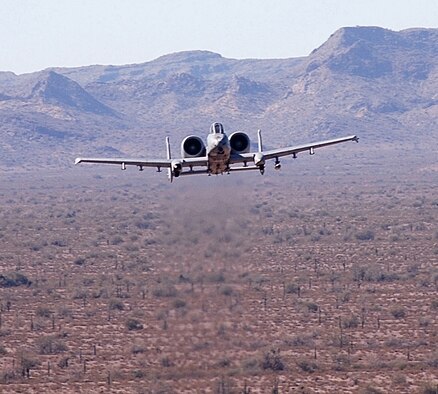 An Air Force Reserve Command A-10 Thunderbolt II from the 303rd Fighter Squadron, part of the 442nd Fighter Wing at Whiteman Air Force Base, Mo., flies low over the Barry M. Goldwater Range, Ariz., after dropping its payload during a  training exercise Feb. 26, 2007.
Based from Davis-Monthan Air Force Base, Ariz., the reservists used the range's more than 2,700 square miles to practice tactics and drop live ordance. (U.S. Air Force photo/Staff Sgt. Tom Talbert) 