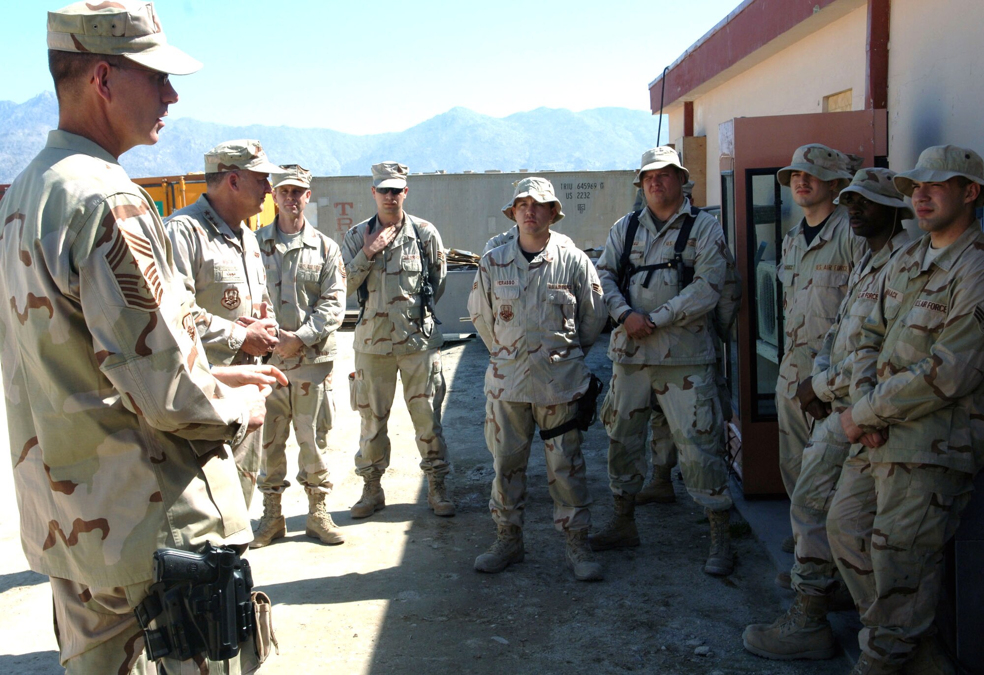 Lieutenant Gen. Gary North and Chief Master Sgt. Richard Small visit with Airmen at the Mehtar Lam Provincial Reconstruction Team in Afghanistan. General North is the U.S. Central Command Air Forces commander and Chief Small is the CENTAF command chief master sergeant. (U.S. Air Force photo/Capt. Travis B. Tougaw)