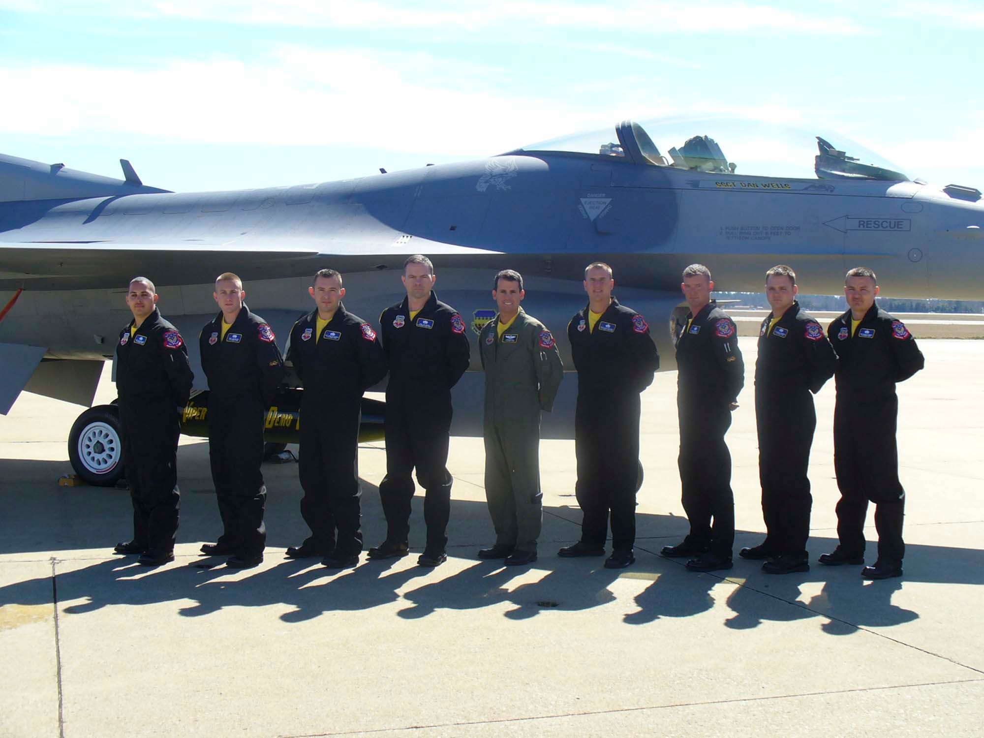 SHAW AIR FORCE BASE, S.C. -- The Viper East F-16 Demonstration Team stand in front of the demo jet. From left: Staff Sgt. Jeffery Williams, avionics technician; Staff Sgt. Thomas Wilson, crew chief; Staff Sgt. Chris Blakowski, crew chief; Tech. Sgt. Joe Moore, assitant team chief; Maj. Jason Koltes, demonstration pilot and demo team commander; Master Sgt. Doug Reichert, NCOIC and team chief; Staff Sgt. Dan Wells, lead crew chief; Senior Airman David Linenburg, crew chief, and Staff Sgt. Brian O'Connor, avionics technician. The Viper East F-16 Demonstration Team started this year's season March 1 with the annual Heritage Flight training conference at Davis-Monthan Air Force Base, Ariz. (Courtesy photo)
