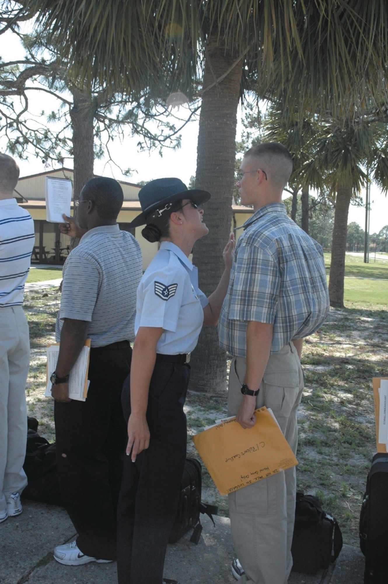 Staff Sgt. Natasha Hebert, 320th Training Squadron military training instructor, welcomes an ROTC cadet to Tyndall AFB in 2006.

If you want to recruit sharp individuals into the Air Force as a recruiter or mold civilians into Airmen as a military training instructor, the Air Education and Training Command Special Duty Briefing Team can answer any questions you may have concerning these careers. 

The team will brief all aspects of special duty opportunities 8:45 a.m. March 23 in the Bldg. 226 auditorium.  Airman 1st classes with at least 24 months time in service through master sergeants with less than 17 years total active federal military service are invited to attend the briefing and are eligible to apply for these special duty assignments. Spouses are highly encouraged to attend.    

The team can expedite the processing of an applicant’s special duty application if it is brought to the briefing. To obtain a copy of the AETC special duty application, contact the Master Sgt. Travis Fritts at 283-2222. 
