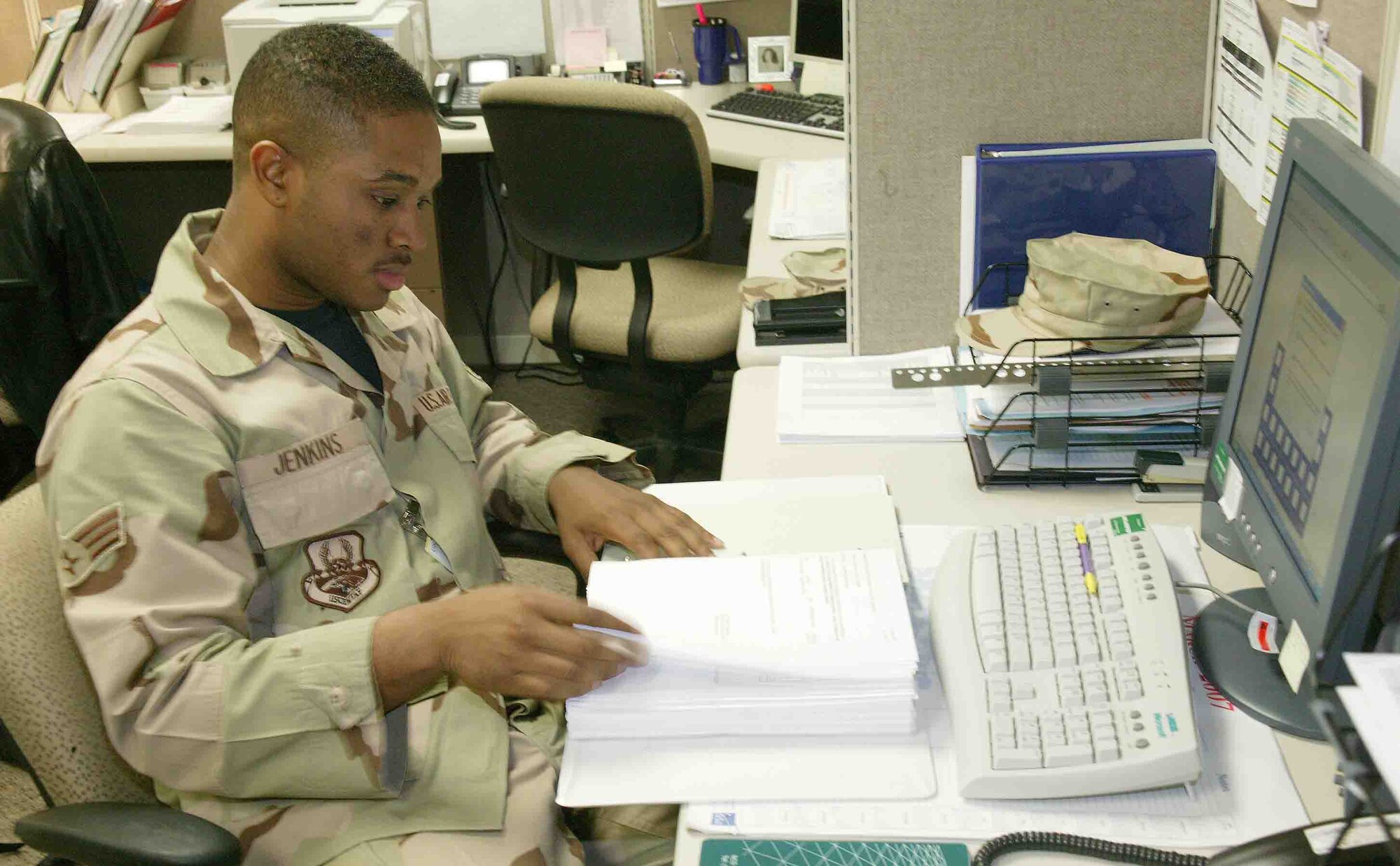 SHAW AIR FORCE BASE, S.C. -- Senior Airman Dwan Jenkins, 609th Air Support Squadron material management journeyman, conducts research for a deployed customer March 7 at the 9th Air Force Headquarters building. Airman Jenkins provides equipment and supply support to 14 air expeditionary force wings in the U.S. Central Command area of responsibility. The Hampton, Va., native is also a member of the Shaw Air Force Base Honor Guard. Airman Jenkins has served in the Air Force for four years and enjoys playing with his daughter in his spare time. He enjoys the Air Force for its people and educational opportunities. (U.S. Air Force photo/Senior Airman John Gordinier)
