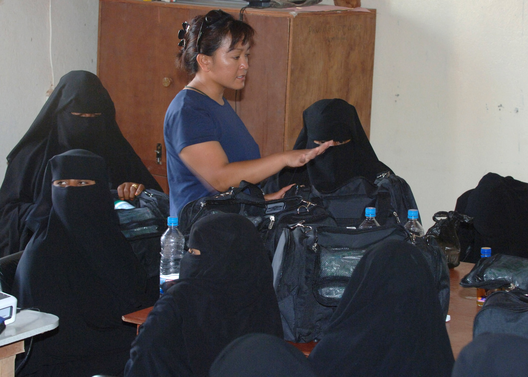 Air Force Maj. Pauline Lucas explains the contents of a veterinary bag as part of a Combined Joint Task Force-Horn of Africa veterinary civic action project on the island of Socotra, Yemen. The objective of the project was to teach women on the island basic animal husbandry techniques. Those learned skills will be used to improve the country's overall livestock health and productivity, as well as educate others villagers. Major Lucas is a CJTF-HOA public health officer. (U.S. Air Force photo/Tech. Sgt. Carrie Bernard) 