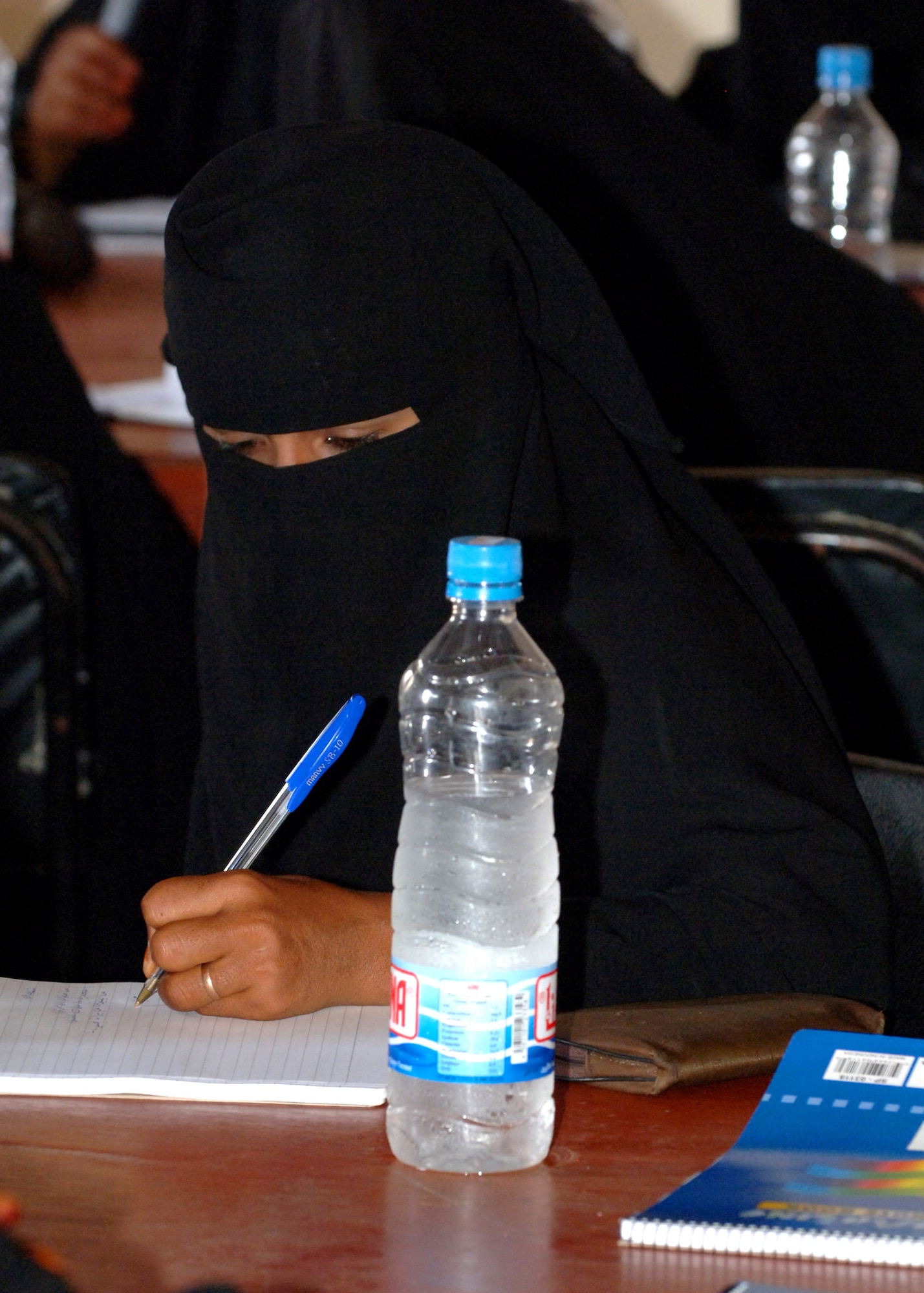 A Yemen animal health worker takes notes during a lecture as part of a Combined Joint Task Force-Horn of Africa veterinary civic action project on the small island of Socotra. The objective of the project was to teach women on the island basic animal husbandry techniques. Those learned skills will be used to improve the country's overall livestock health and productivity, as well as educate others villagers. (U.S. Air Force photo/Tech. Sgt. Carrie Bernard) 