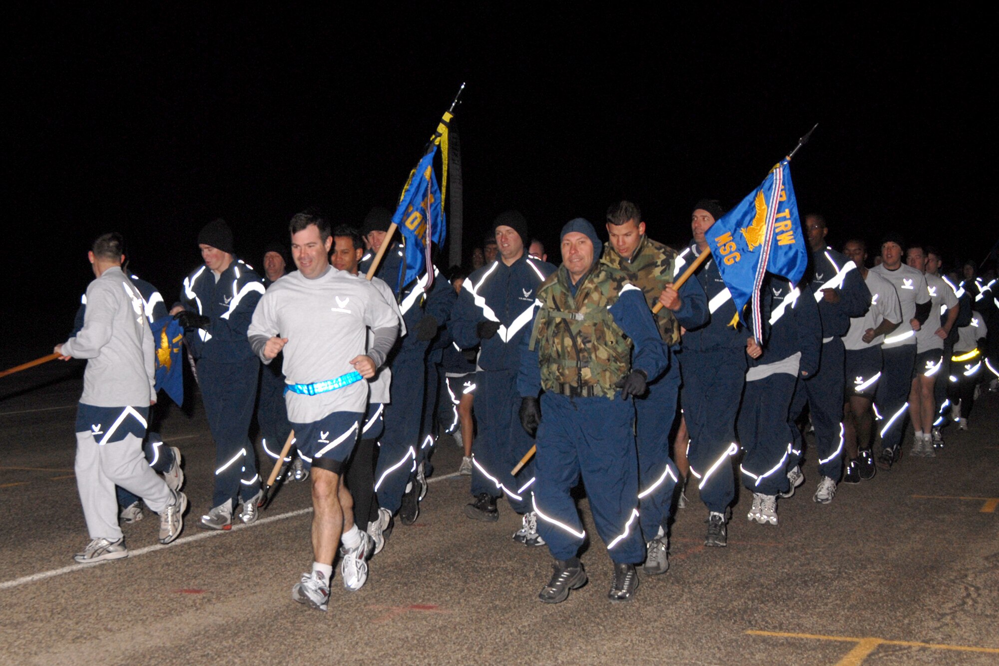 Col. Scott Bethel leads the 17th Training Wing in the Warrior Run March 2. The event was Col. Bethel’s last warrior run as 17 TRW commander. Also leading the charge were Col. Stephen Czerwinski, 17th Mission Support Group commander (right, in flak vest) and 1st Lt. Dean Smith (carrying guidon behind Col. Czerwinski, also in flak vest). Airmen from the 17 MSG, 17th Medical Group, 17th Training Group and the Goodfellow NCO Academy, as well as Soldiers from the 344th Military Intelligence Battallion, Sailors from the Center for Information Dominance and Marines from the Marine Corps Detachment, all took part in the 2.2 mile run.