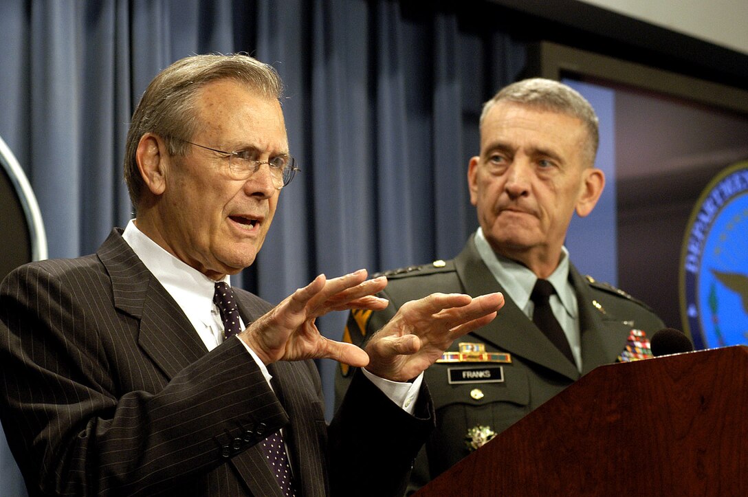 Secretary of Defense Donald H. Rumsfeld tells reporters about the progress coalition forces are making in Iraq during a Pentagon press briefing with U.S. Army Gen. Tommy Franks, on May 9, 2003. Franks is the commander, Central Command. DoD photo by R.D. Ward. 