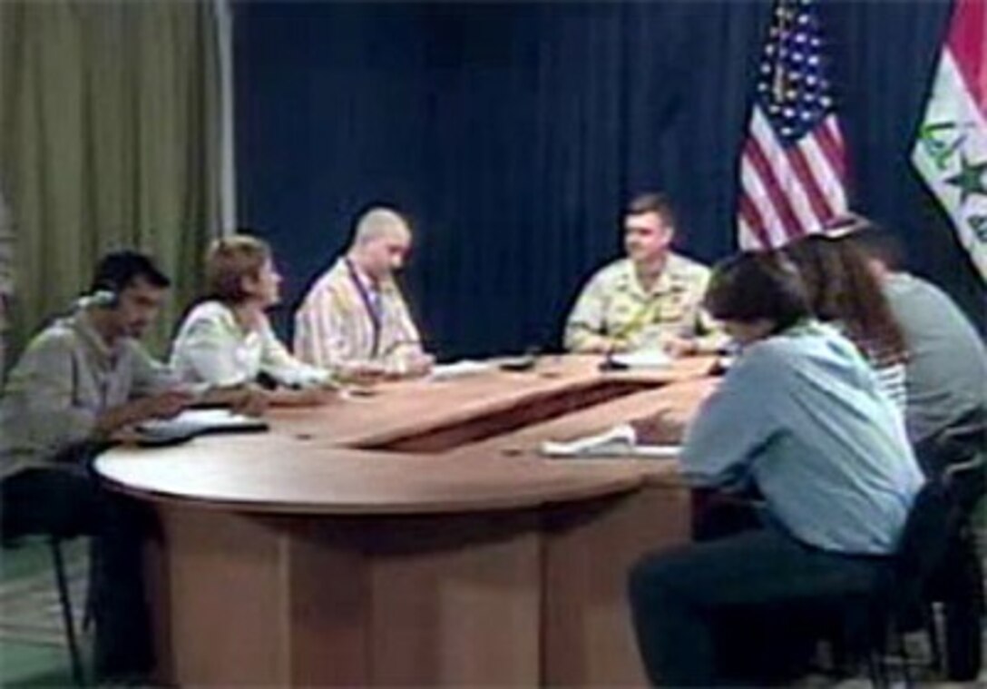 Communications Division Chief, Strategic Effects, Multi-National Force-Iraq U.S. Navy Rear Adm. Mark Fox, and Air Component Coordination Element Director U.S. Air Force Brig. Gen. Stephen Hoog speak with reporters in Iraq, March 12. 2007.  