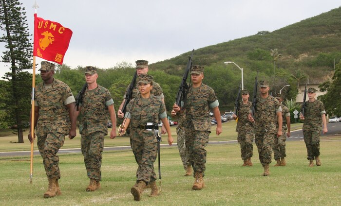 Sergeant Cecilia Reynoso, radio operator, G-6, operations, Marine Corps Forces Pacific, Camp H.M. Smith, Hawaii, prepares to execute eyes right with her platoon during Sergeants Course class 03-07's drill session March 13.