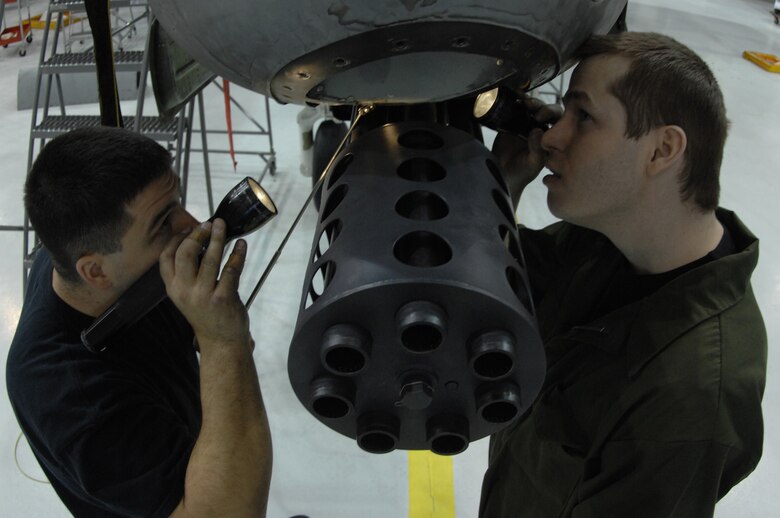EIELSON AIR FORCE BASE, Alaska -- Staff Sgt Jason Belanger (left) and Senior Airman Timothy Jeter (right), both from the 354th Maintenance Squadron, inspect the nose section of an A/OA-10 Thunderbolt II during Phase maintenance on Mar. 13. Phase maintenance is an overhaul of the entire aircraft which ensures it is ready for safe flight.The 354th Maintenance Squadron is in charge of the Phase program and can turn an A-10 around in 10 days.
(U.S. Air Force Photo by Staff Sgt Joshua Strang)