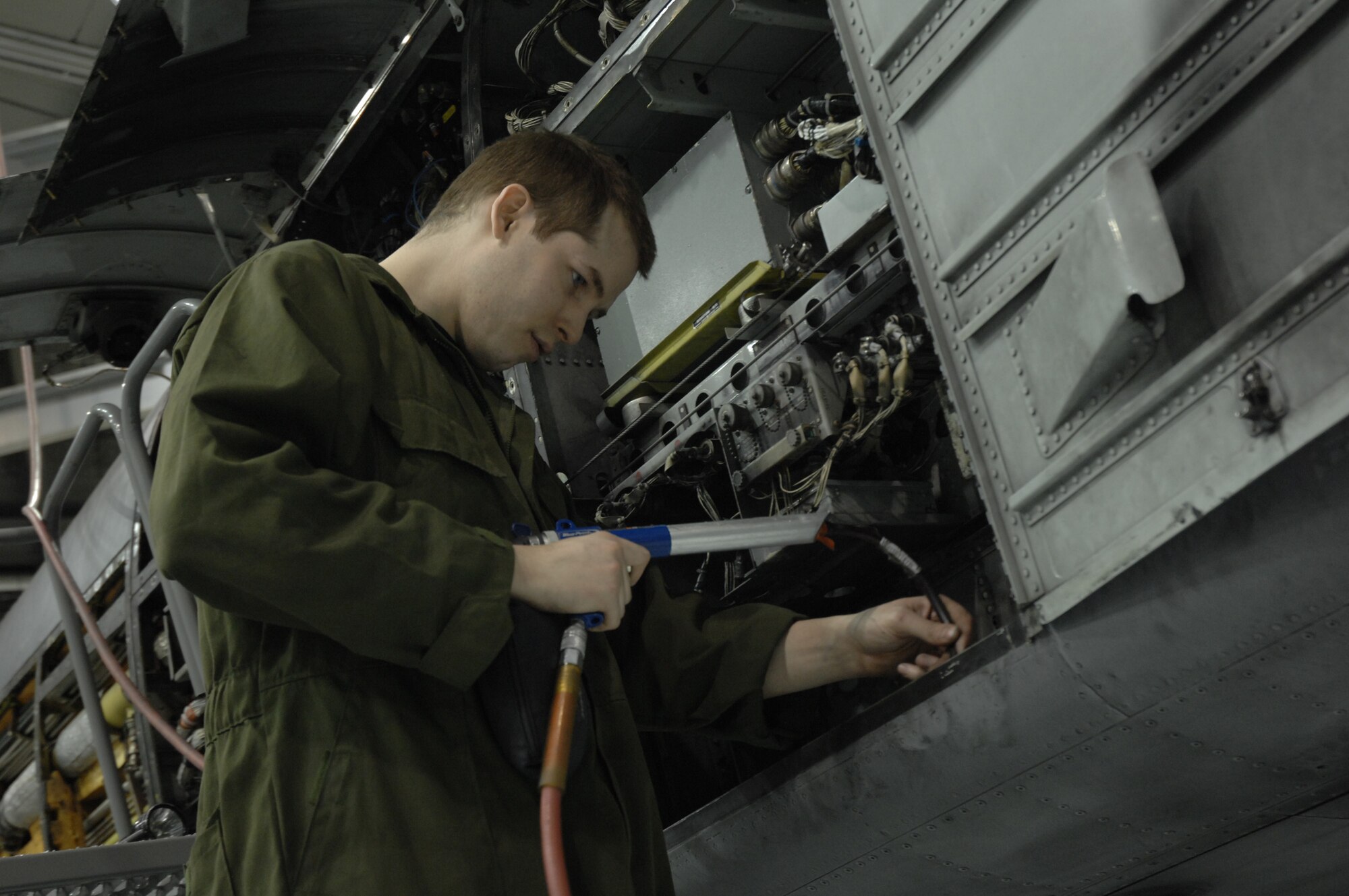 EIELSON AIR FORCE BASE, Alaska -- Senior Airman Timothy Jeter, 354th Maintenance Squadron, cleans an A-10 Thunderbolt II section with a vacuum during phase maintenance on Mar. 13. Phase maintenance is an overhaul of the entire aircraft which ensures it is ready for safe flight.The 354th Maintenance Squadron is in charge of the Phase program and can turn an A-10 around in 10 days.
(U.S. Air Force Photo by Staff Sgt Joshua Strang)