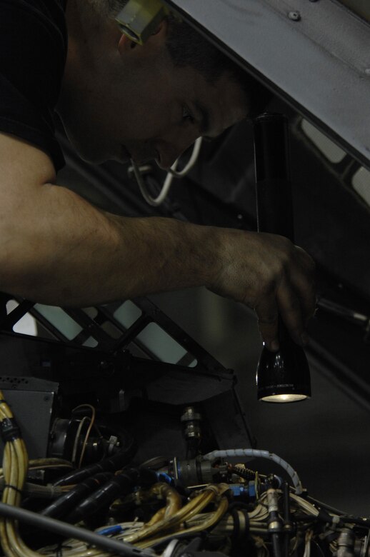 EIELSON AIR FORCE BASE, Alaska -- Staff Sgt Jason Belanger, 354th Maintenance Squadron (MXS), inspects the nose section of an A-10 Thunderbolt II during Phase maintenance on Mar. 13. Phase maintenance is an overhaul of the entire aircraft which ensures it is ready for safe flight.The 354th MXS is in charge of the Phase program and can turn an A-10 around in 10 days.
(U.S. Air Force Photo by Staff Sgt Joshua Strang)