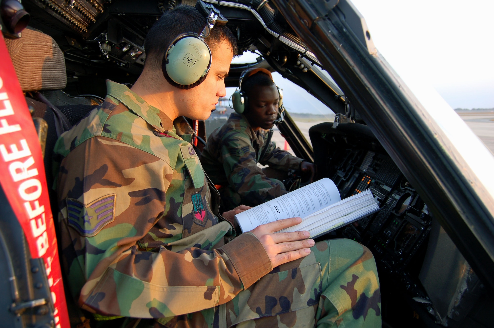 Staff Sgt. David Cabrena and Senior Airman Berry Lynch perform a functional check March 12 on the Moody Air Force Base, Ga., flightline. The Airmen are 723rd Aircraft Maintenance Squadron instrument and flight control systems specialists. (U.S. Air Force photo/Tech. Sgt. Parker Gyokeres) 