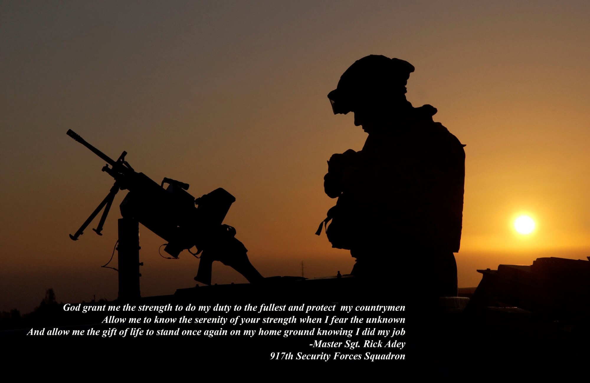 Senior Airman Christopher Cabibi, 917th Security Forces Squadron member, on watch at sunrise in Iraq. (U.S. Air Force courtesy photo)