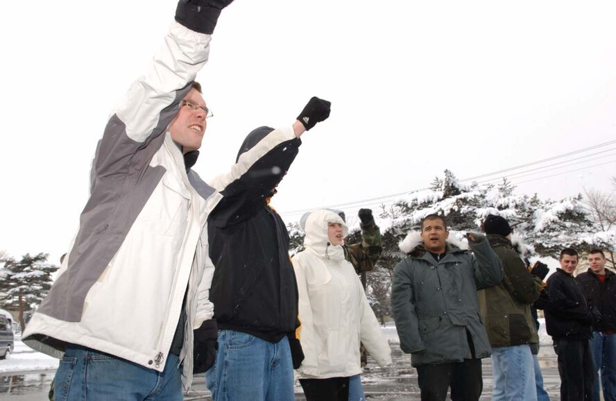 070313-F-0108B-001 MISAWA AB, JAPAN -- Role players perform a simulated protest by Misawa Air Base's front gate during phase one of the base's Operational Readiness Inspection March 13, 2007.  The ORI is designed to make sure the Airmen are ready and able to respond to any combat scenario.(U.S. Air Force photo by Senior Airman Robert Barnett)