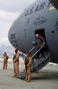 Vice President Dick Cheney emerges from a Charleston C-17 at Bagram Air Base, Afghanistan. A 14th Airlift Squadron aircrew transported the vice president while he was in the Central Command area of responsibility recently. (Courtesy photo)