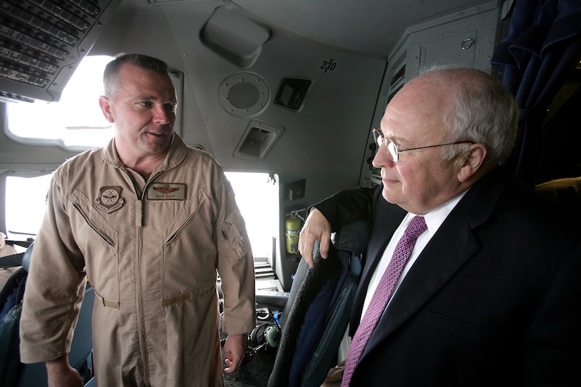 Lt. Col. Rick Rupp, 14th Airlift Squadron commander, visits with Vice President Dick Cheney in the cockpit of a C-17 while en route to Afghanistan. 14 AS aircrew members provided airlift support for the vice president during his recent Middle East tour. (White House photo by David Bohrer)